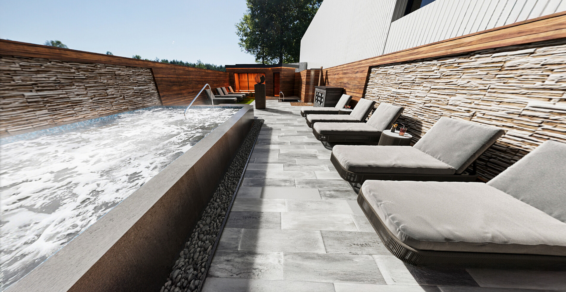 Artist's impression of the Spa Garden, showing loungers and a bubbling outdoor hydropool