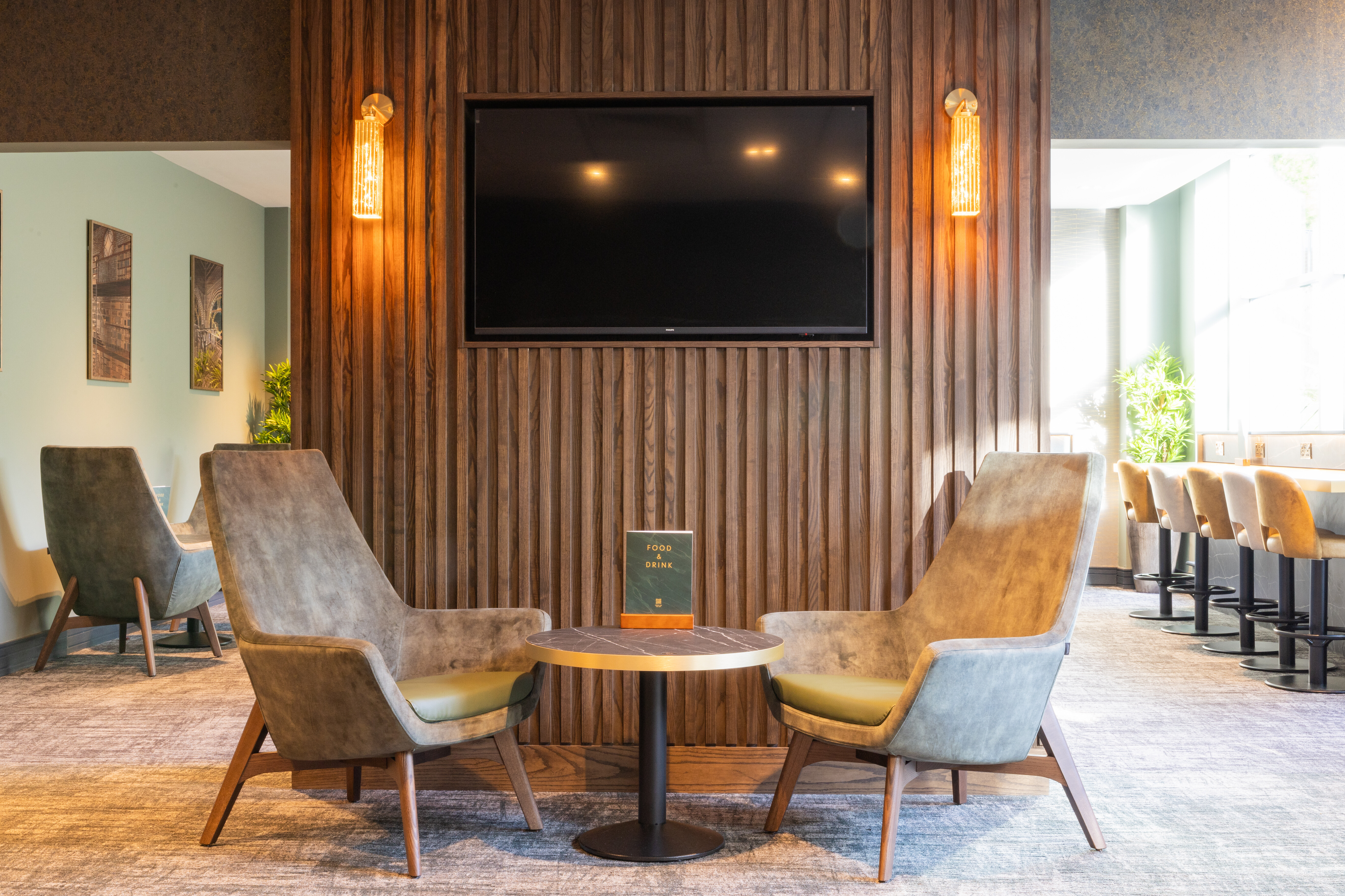 Comfy armchairs at a table in the clubroom