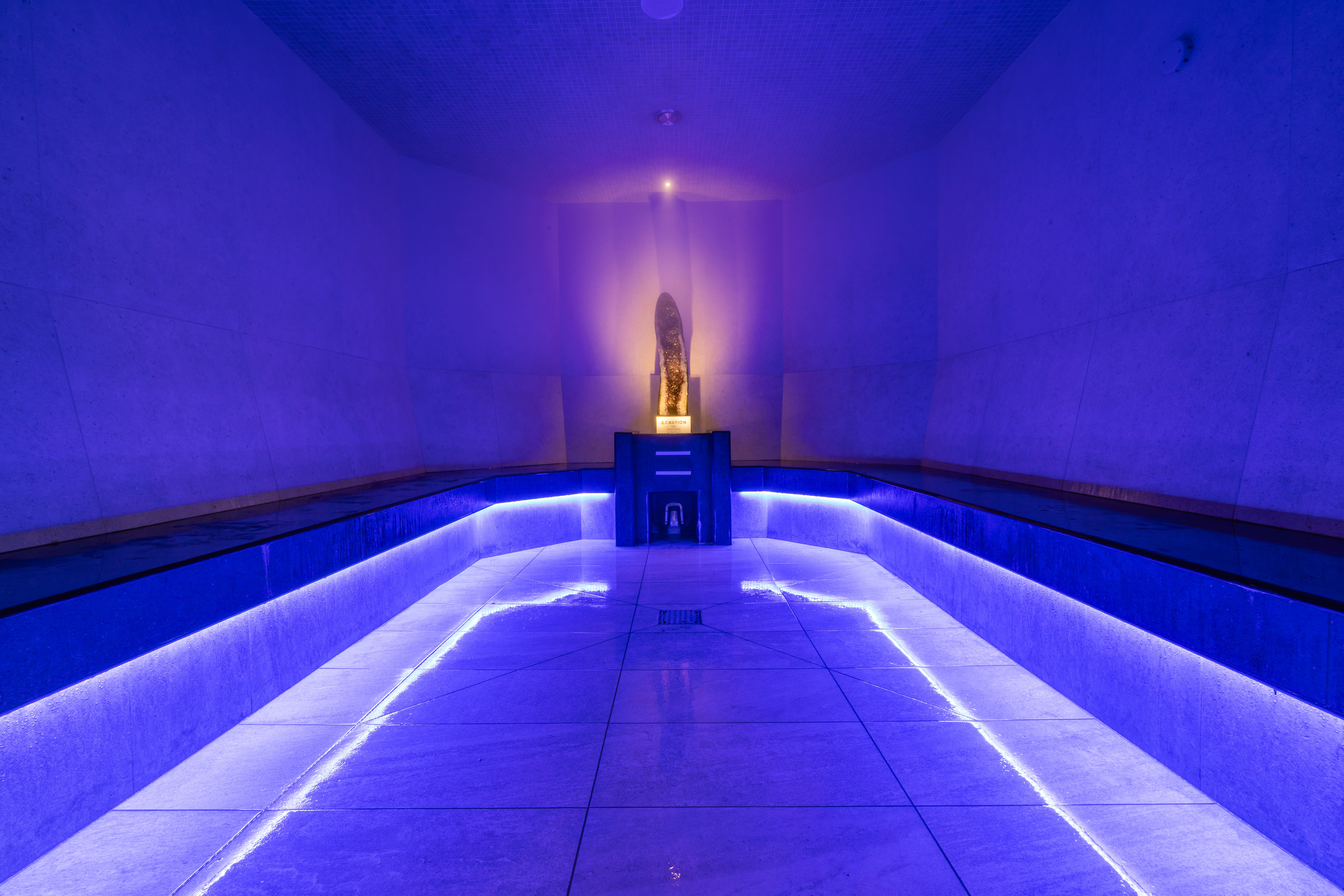 A large amethyst stone in the steam room