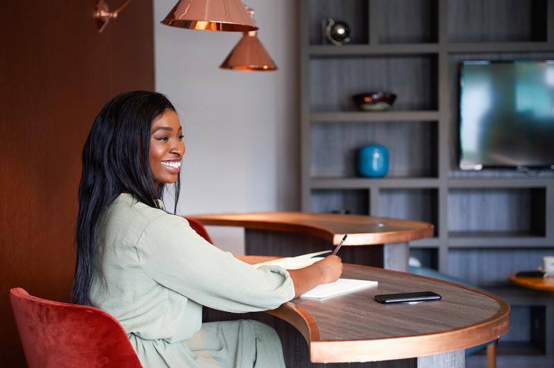A woman working in the clubroom