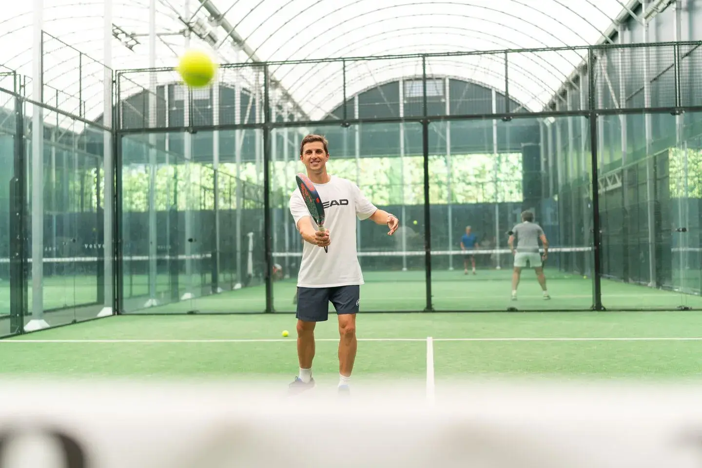 Man playing on an indoor court