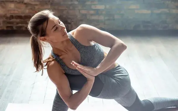 Woman enjoying a Pilates class