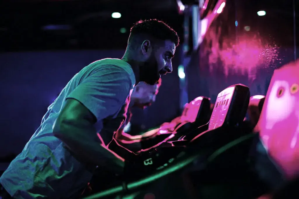 Running on a treadmill during a David Lloyd Clubs BLAZE class