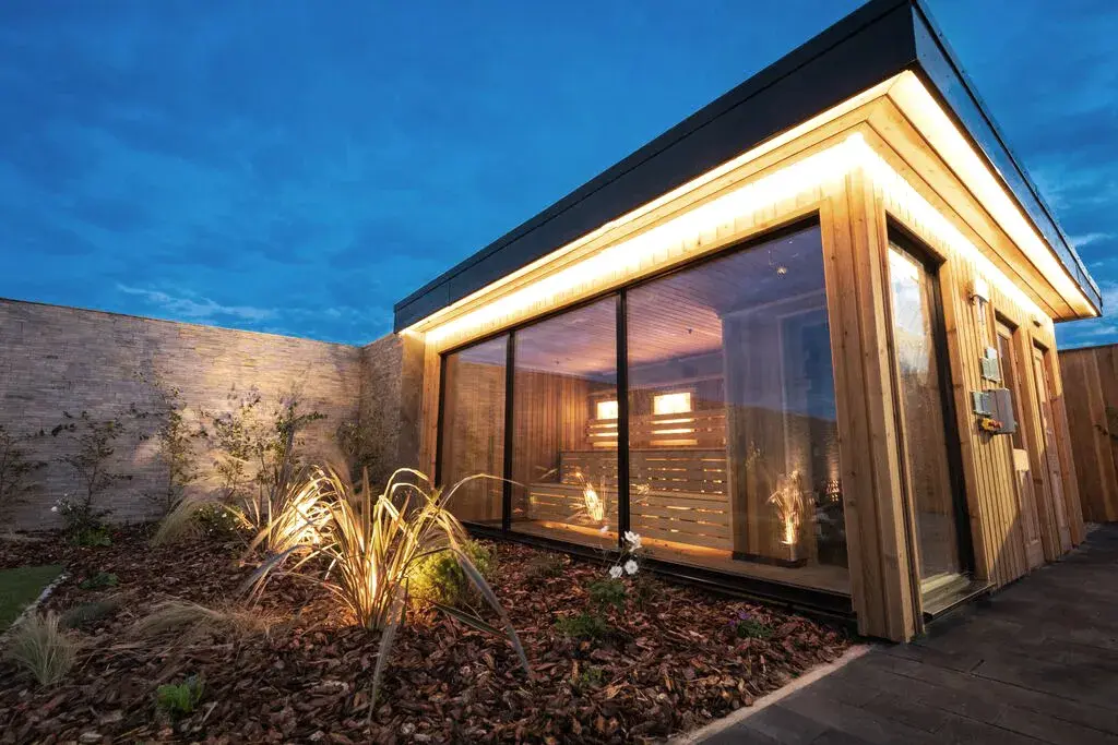 An outdoor sauna in a David Lloyd Clubs spa garden.