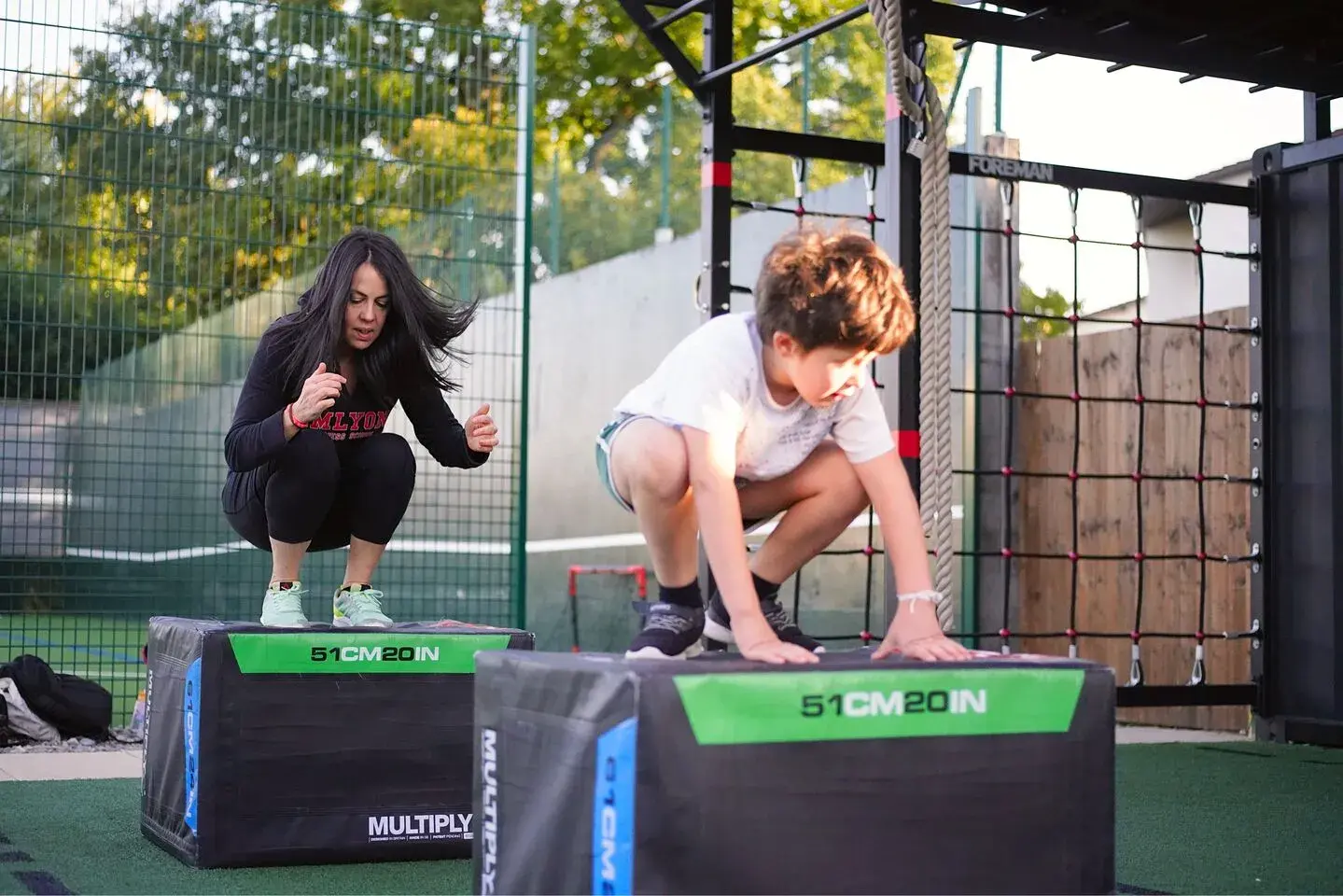 Father and daughter participating in Blaze class