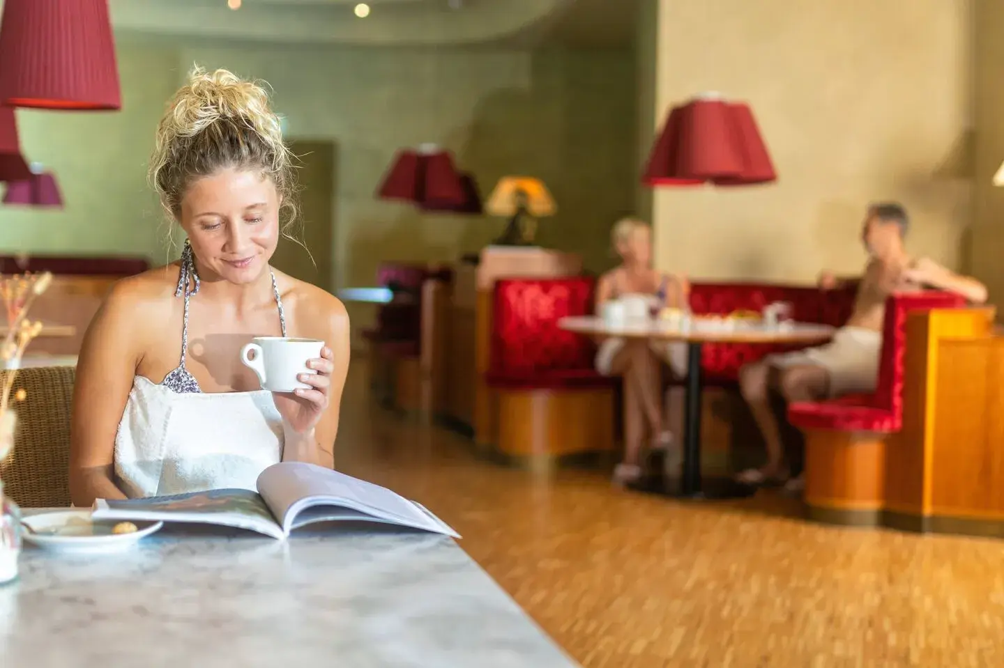 Women enjoying a coffee post-swim