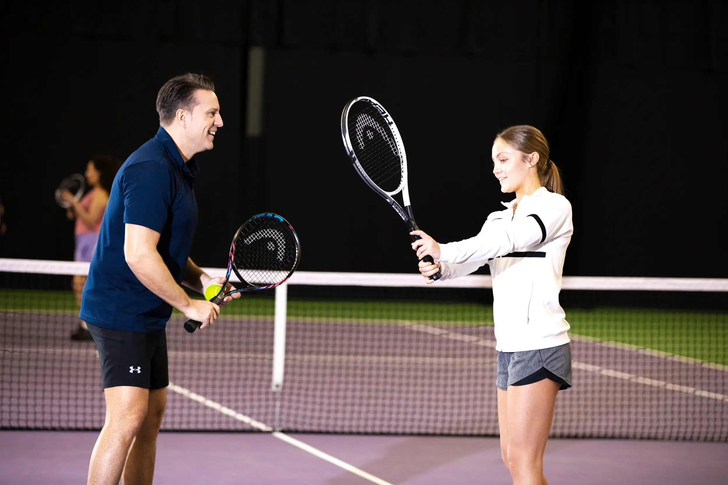 Teen tennis lesson at David Lloyd Clubs