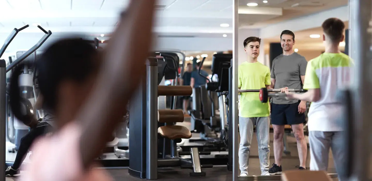 Teen using the equipment in the gym
