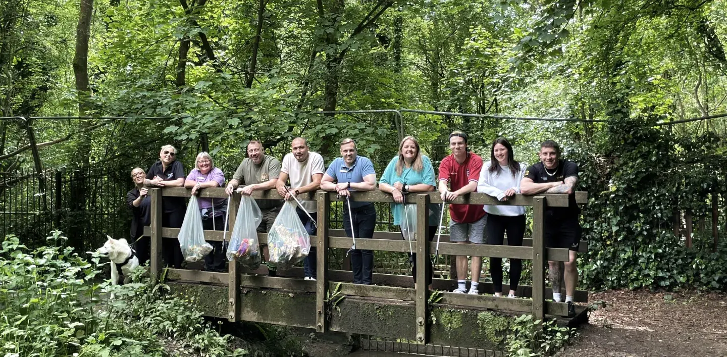 David Lloyd team members cleaning a river
