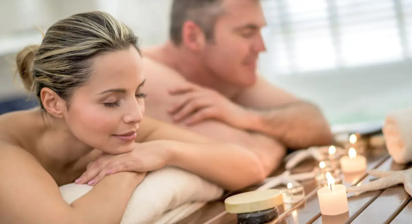 A couple enjoying a spa treatment