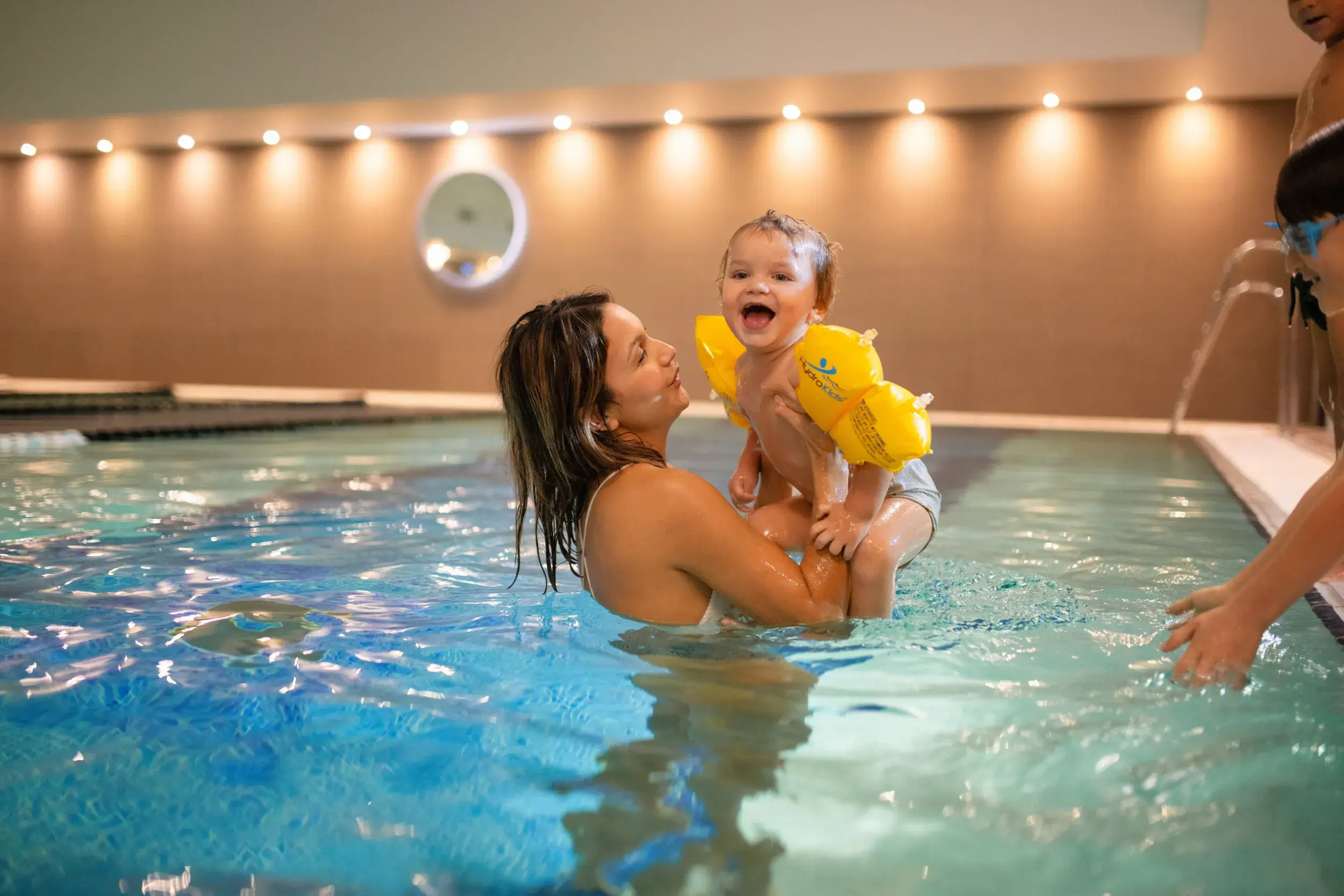 Child learning to swim