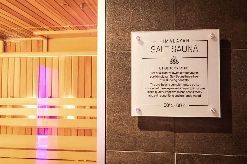 A sign outside a Himalayan salt sauna at a David Lloyd Club