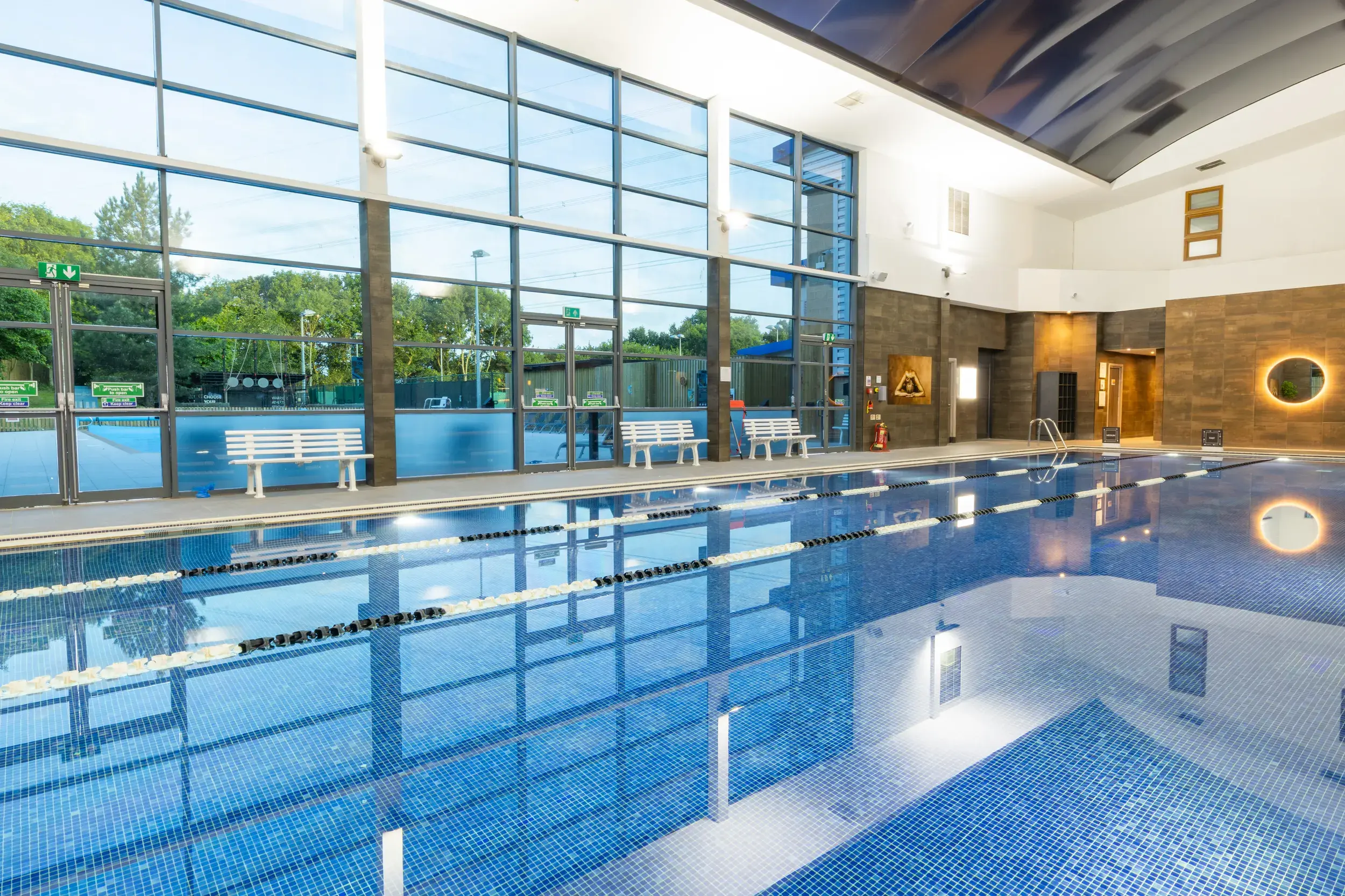 A family in the outdoor pool