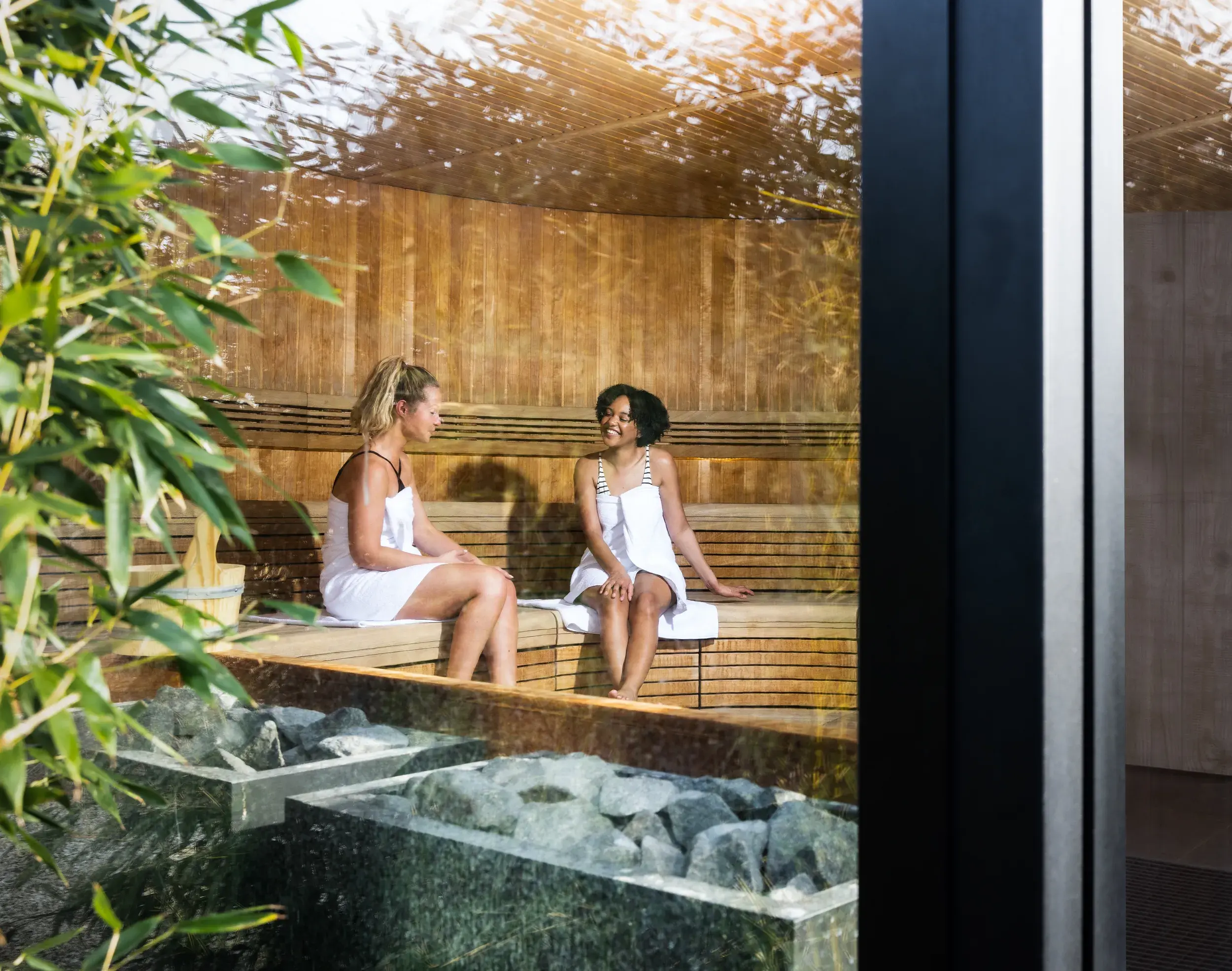 Two ladies enjoying the sauna in the Spa Garden