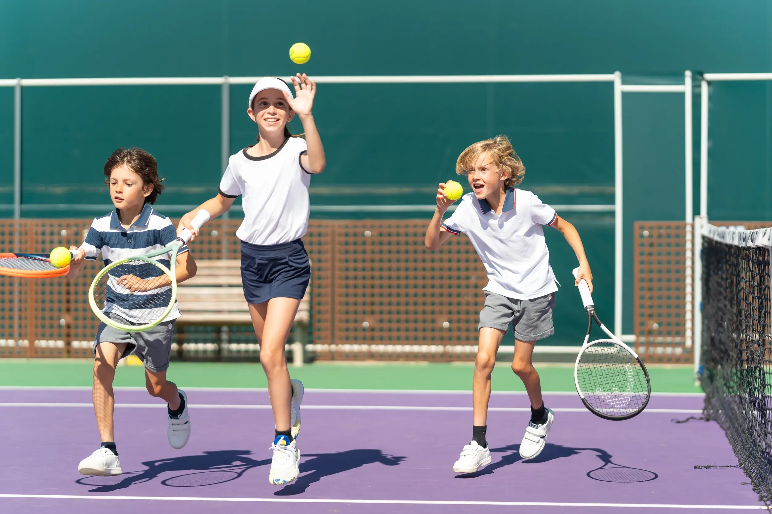 Kids playing tennis