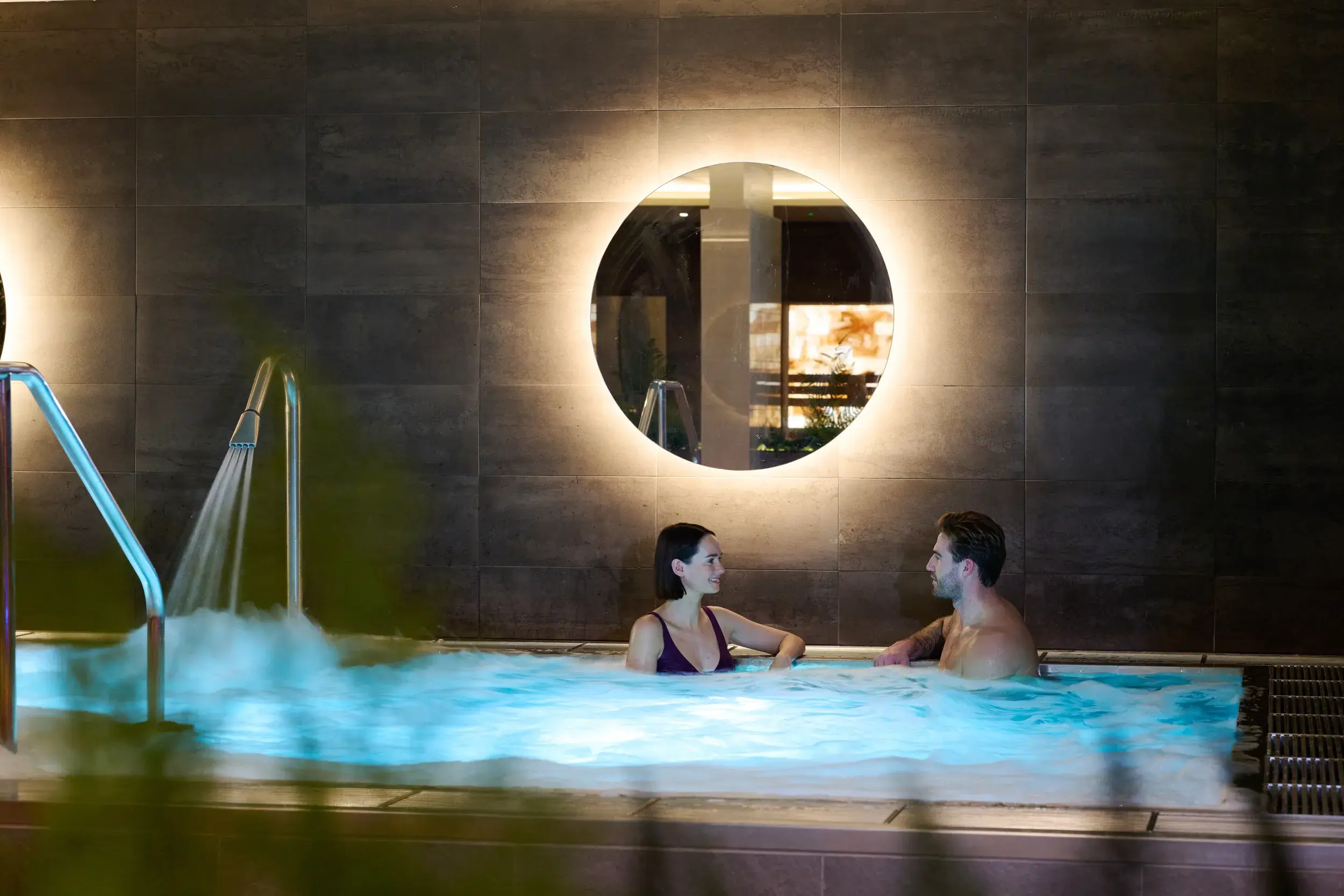 A couple using the hydro pool