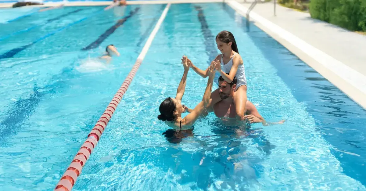 Family in the outdoor pool