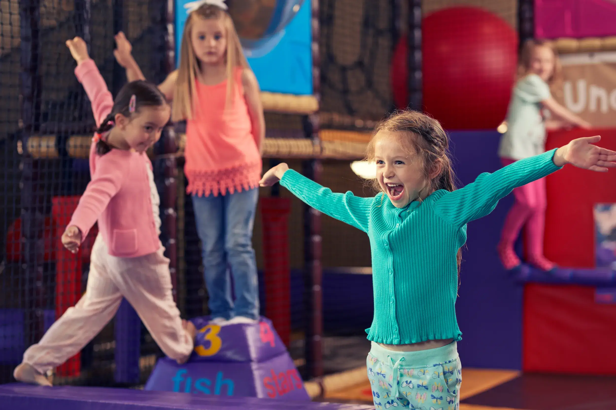 Children playing in soft play