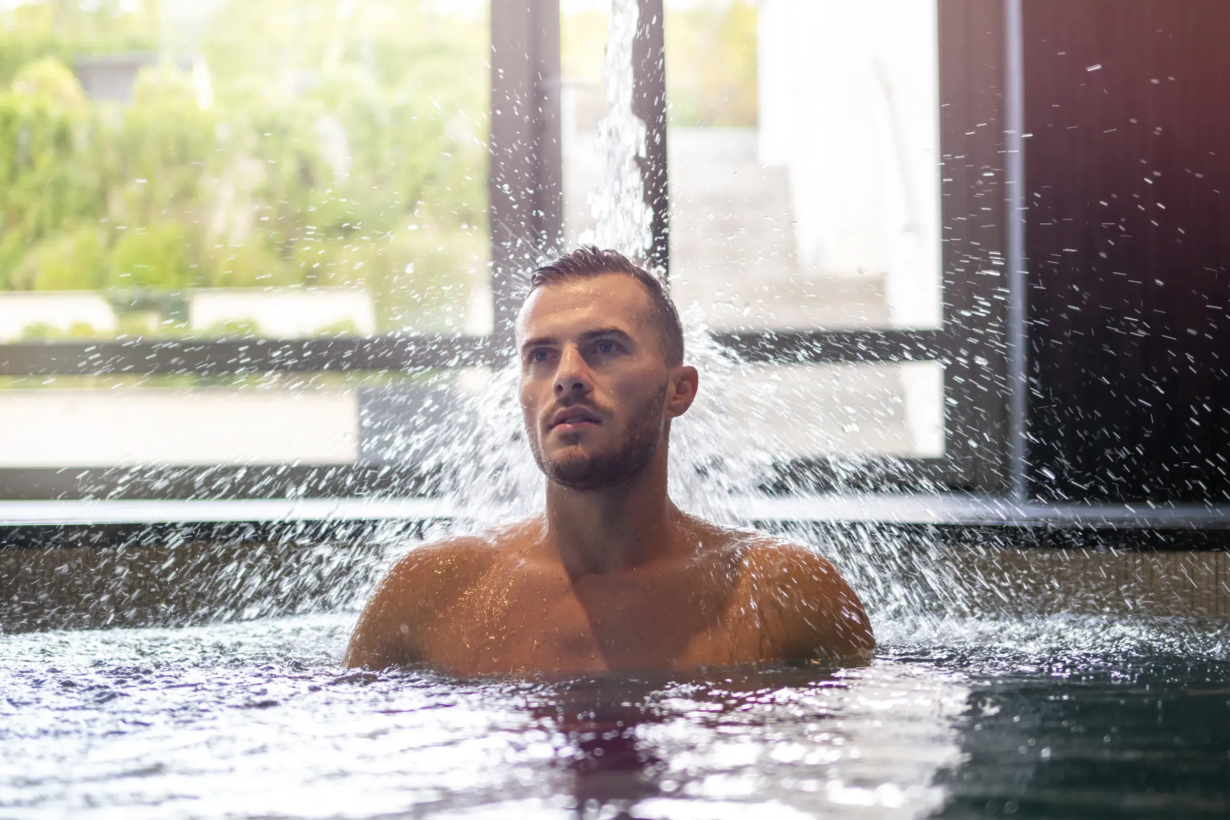 A man in an experience shower