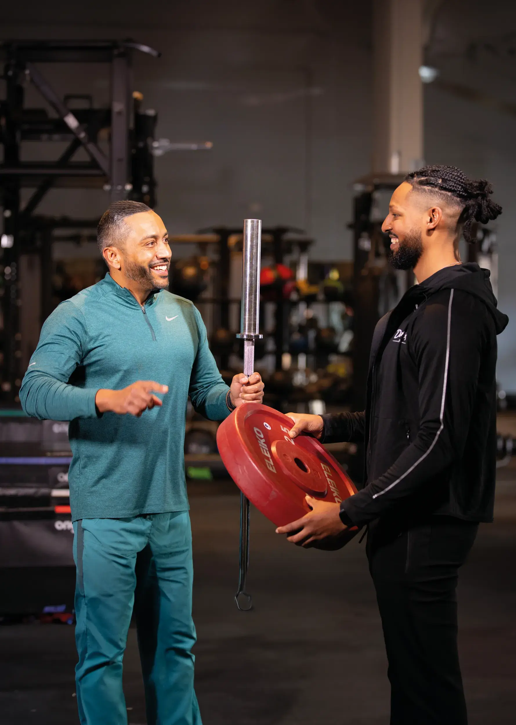 A man with a personal trainer