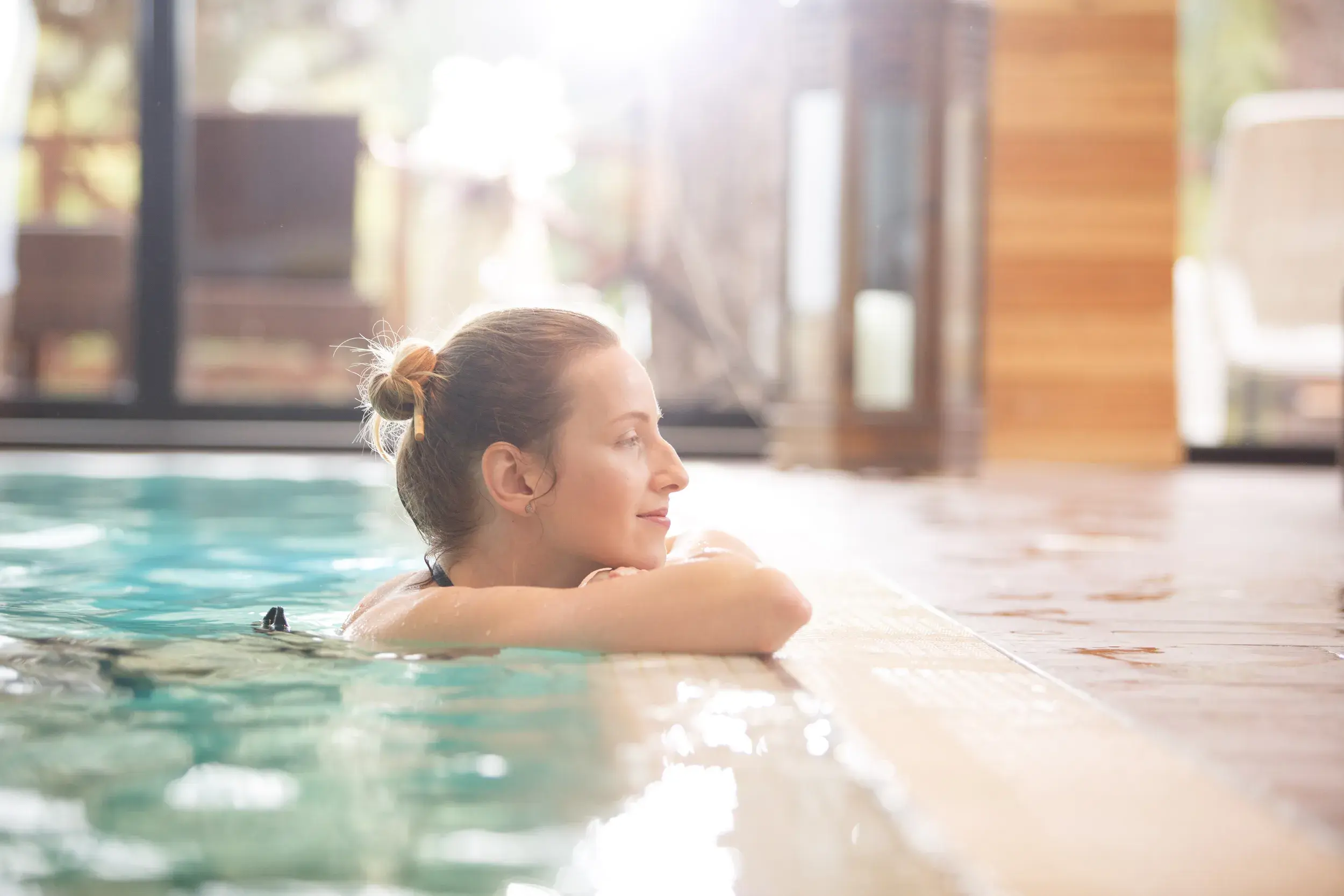 A woman relaxing in the pool