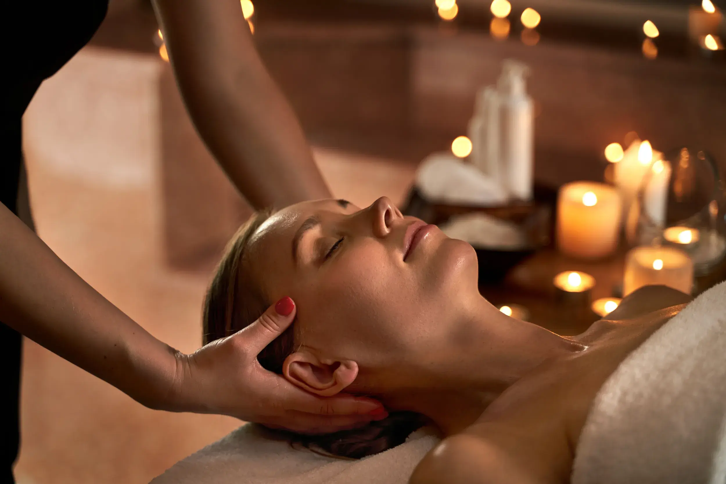A woman lying down in the spa