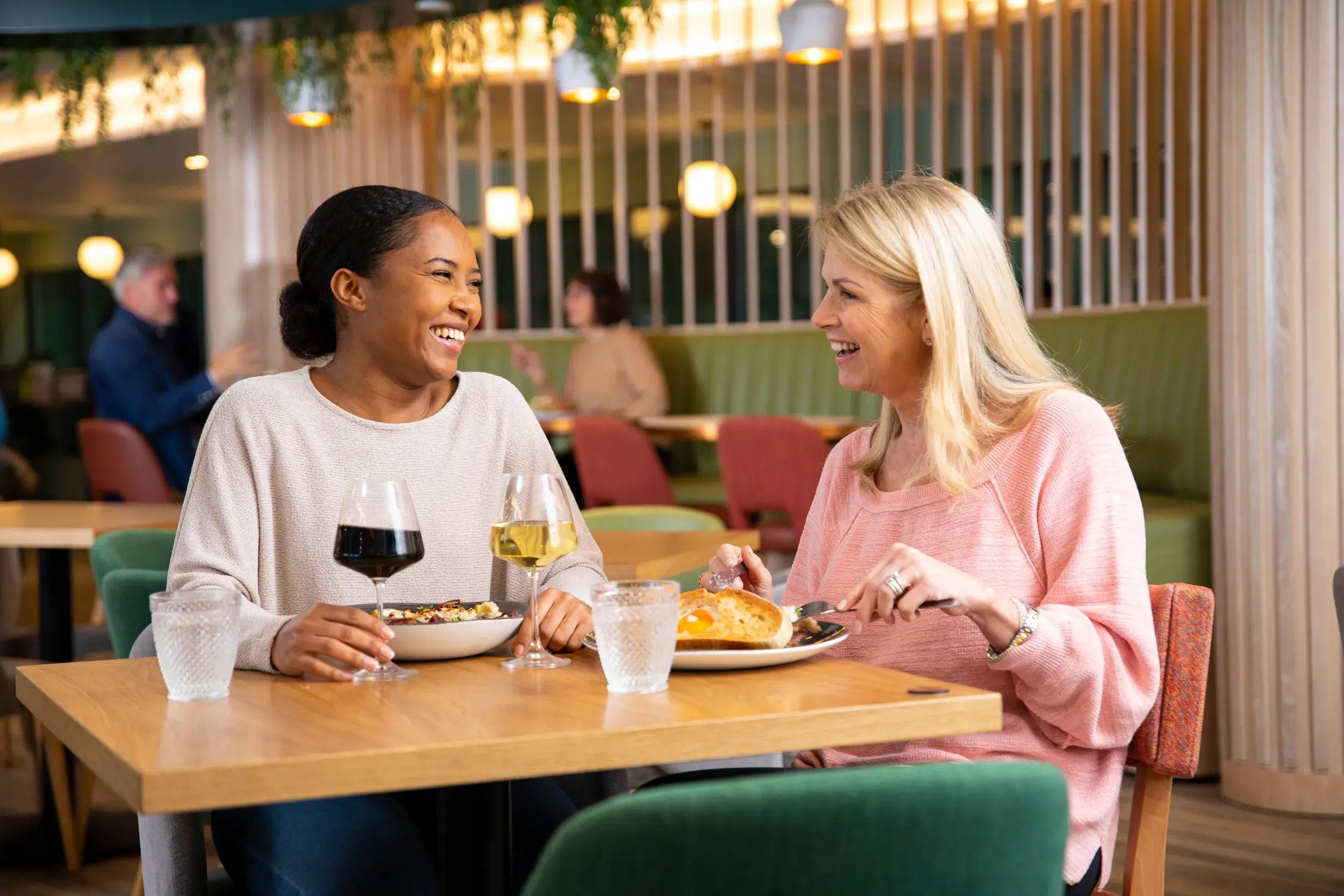 Two women enjoying a meal together