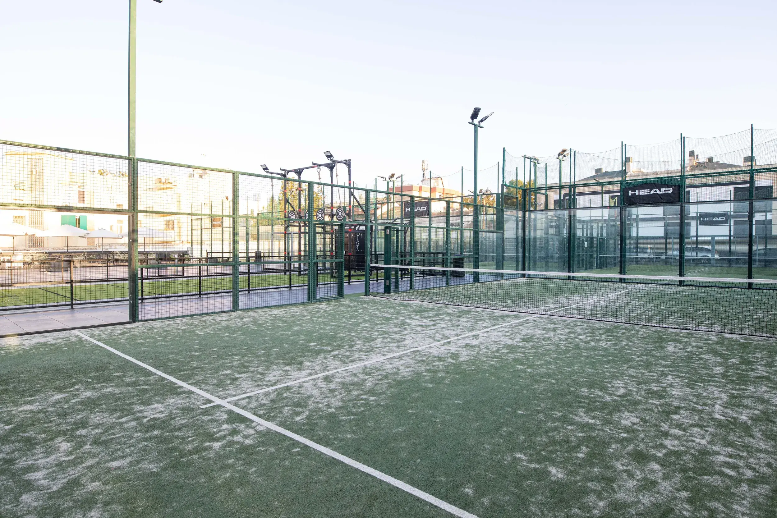 4 people playing a game of Padel