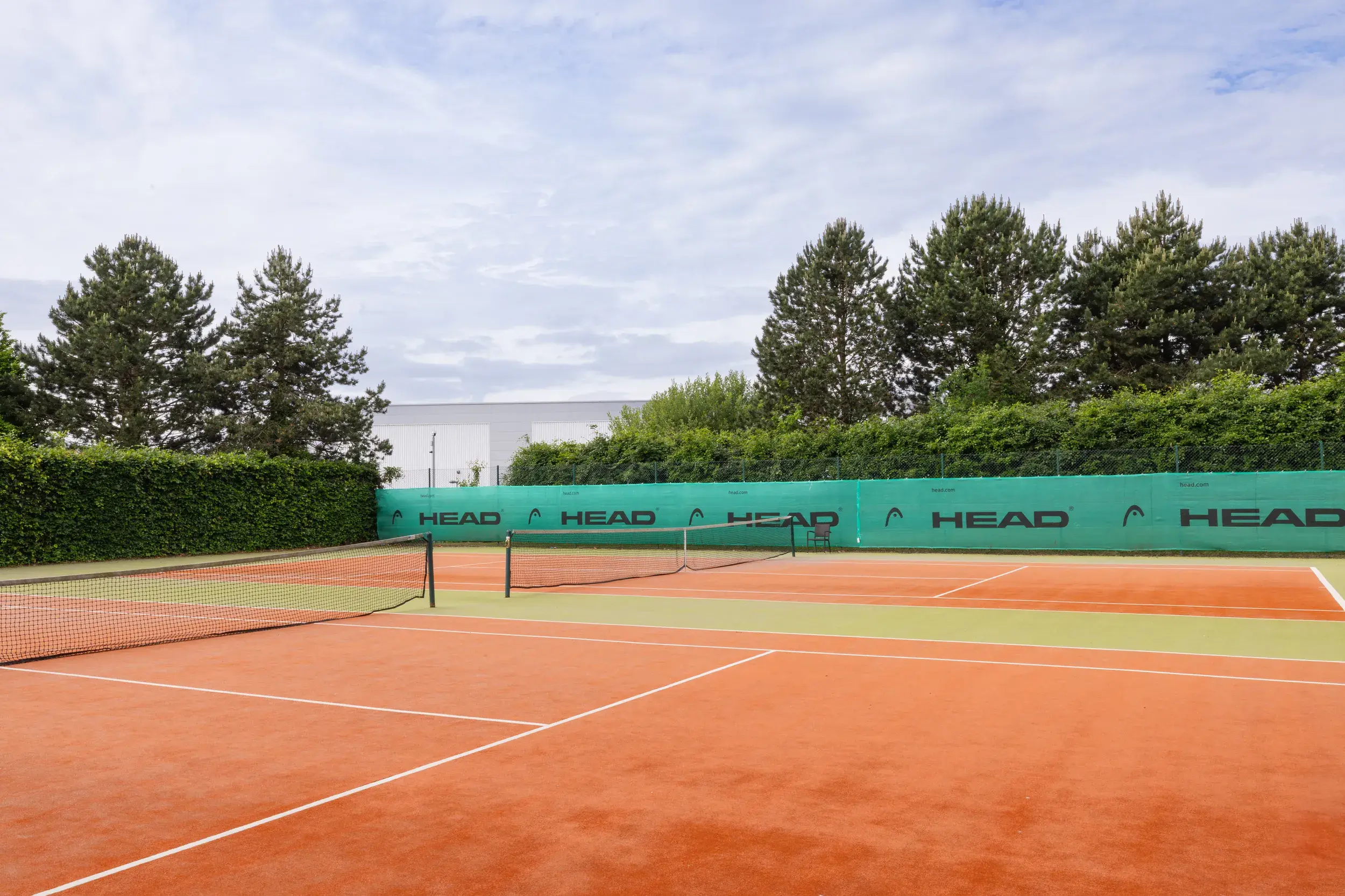 Outdoor tennis court at David Lloyd Liverpool Speke