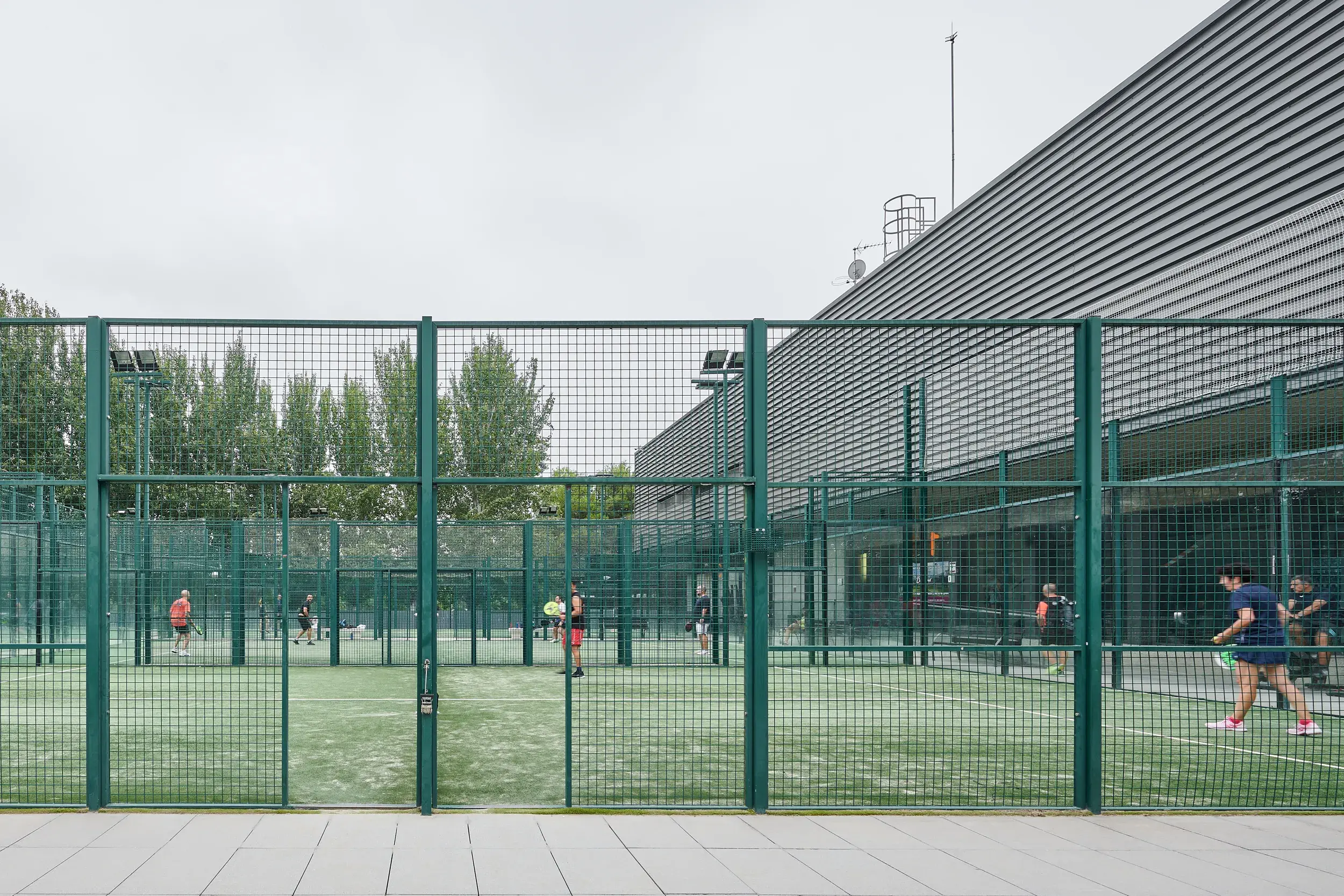 4 people playing a game of Padel