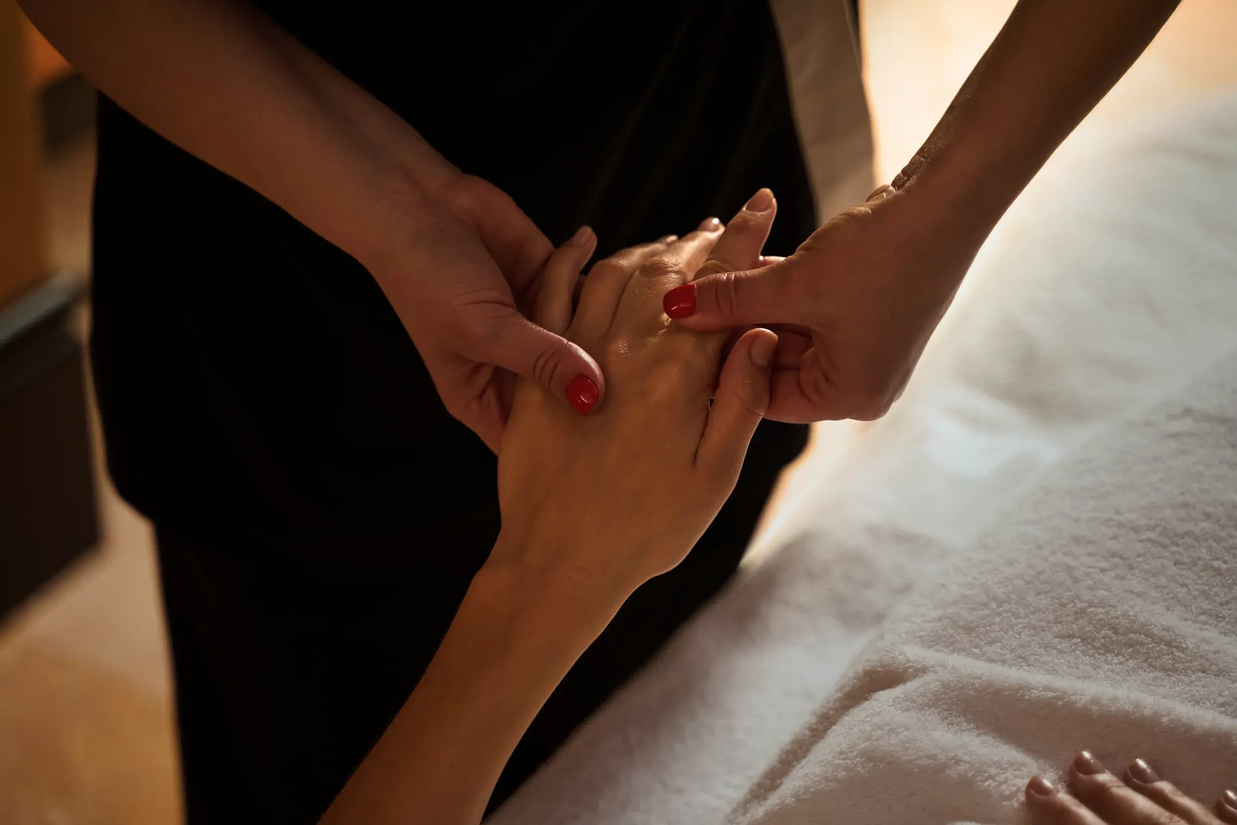 Woman having a hand massage