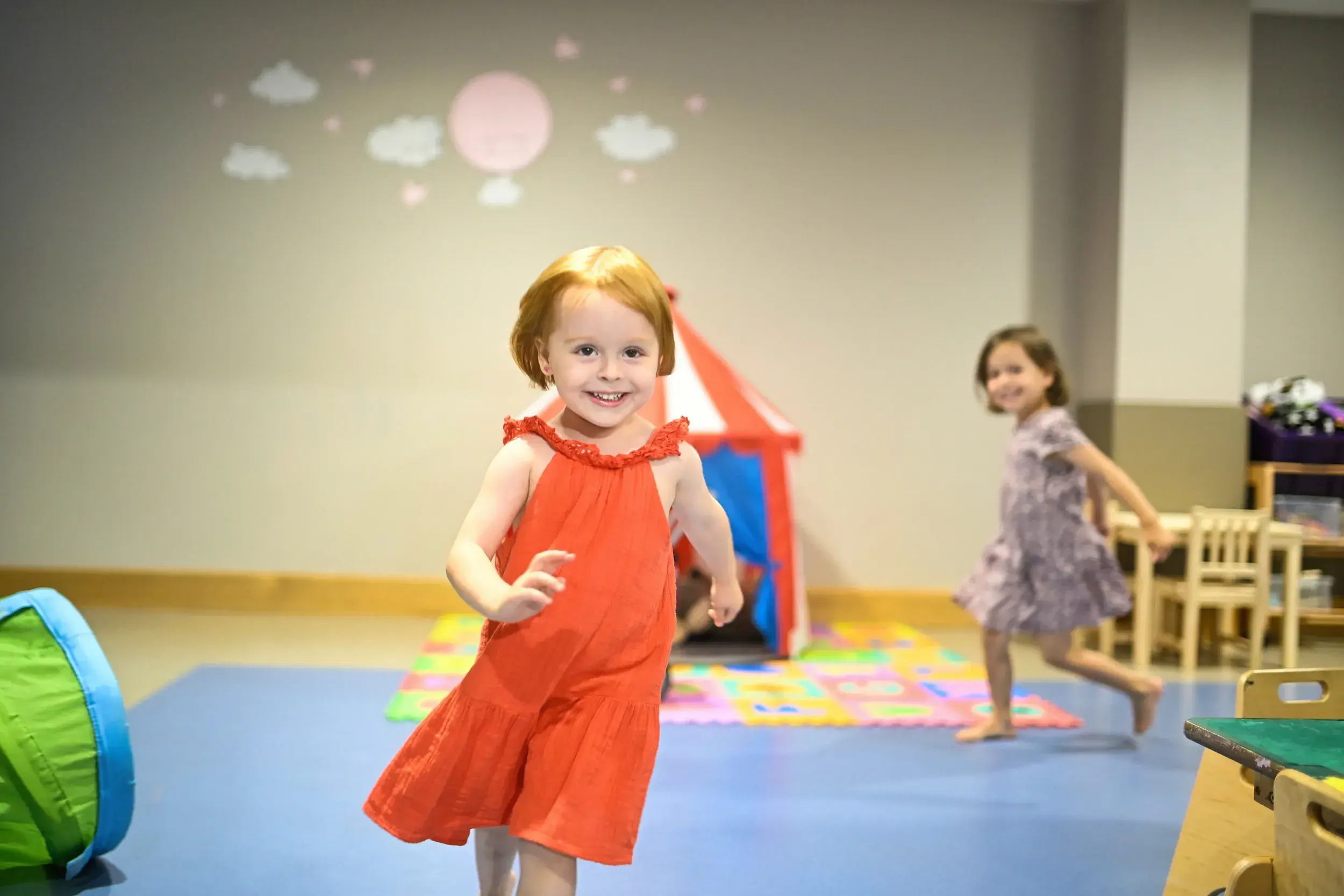 Two young girls running 