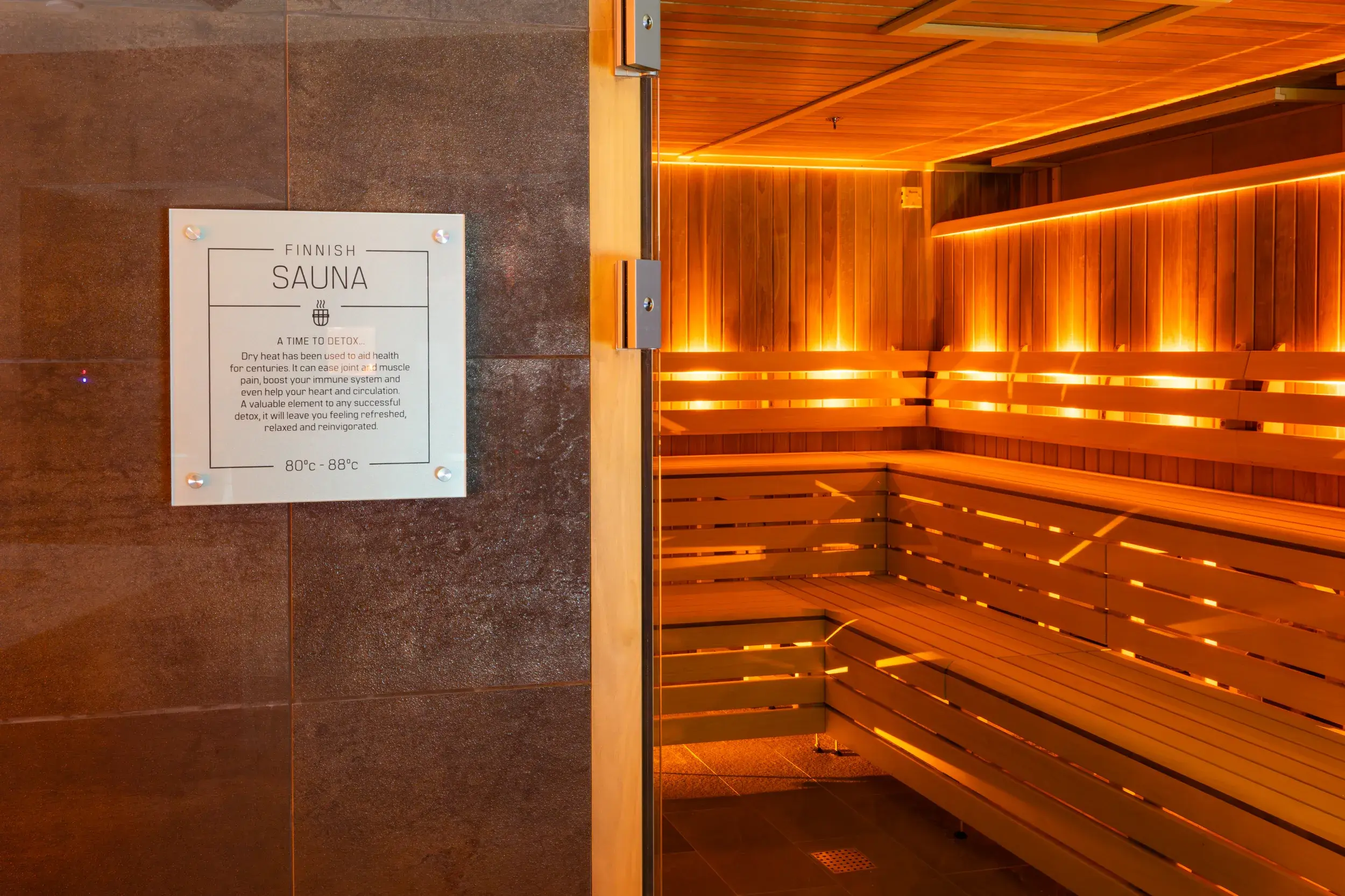Two friends enjoying their time in the Raynes Park steam rooms and sauna