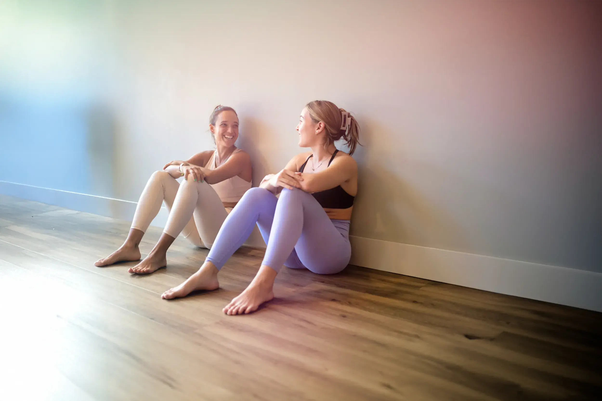 Friends chatting after their yoga class