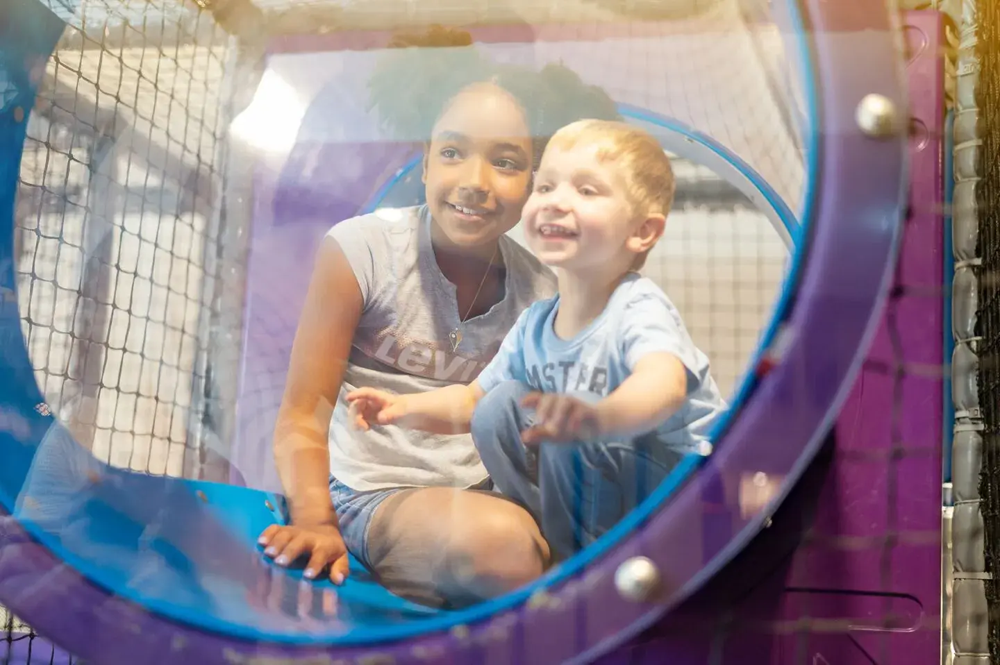 Two children in the soft play