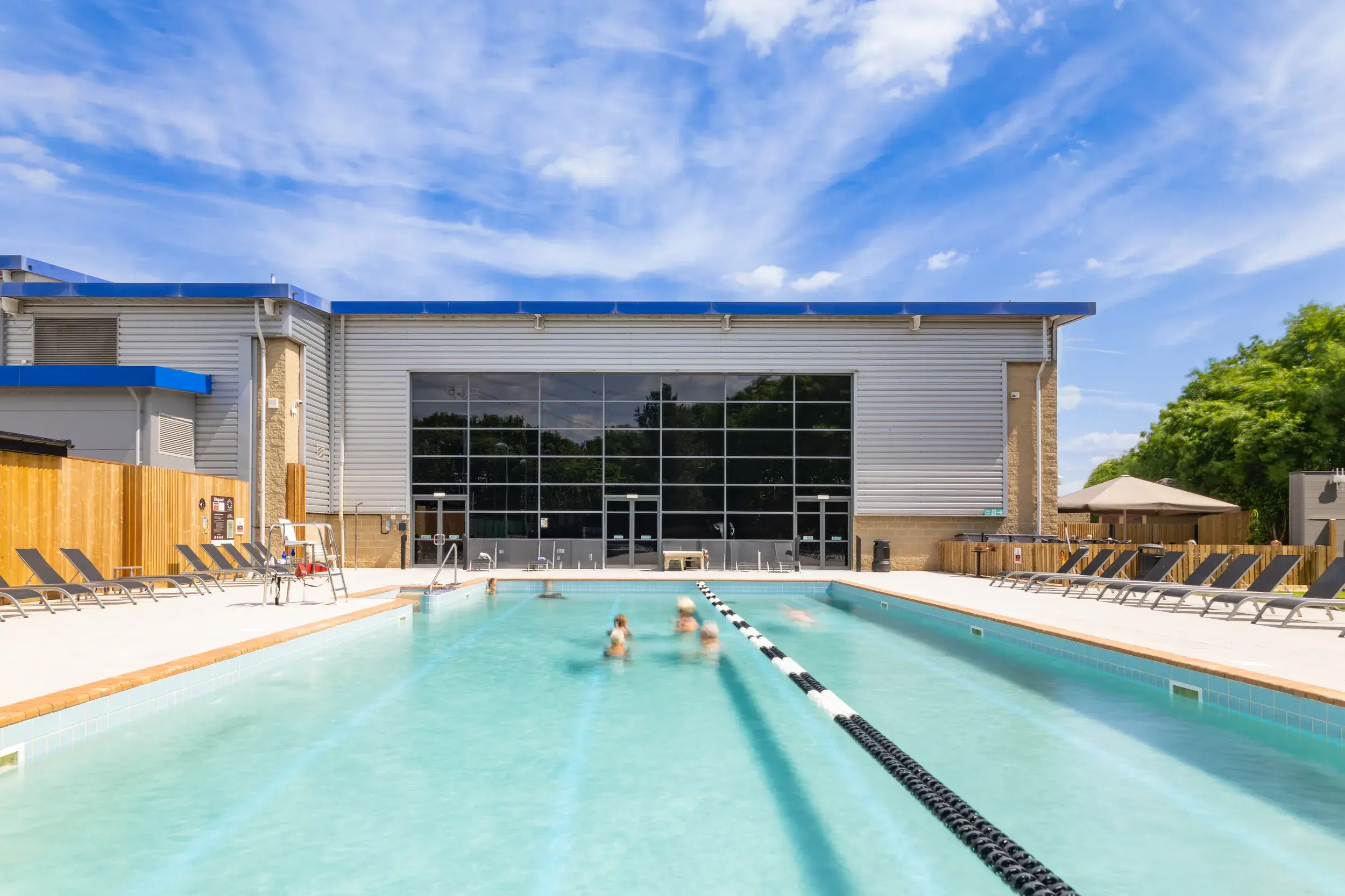 A man swimming outdoors