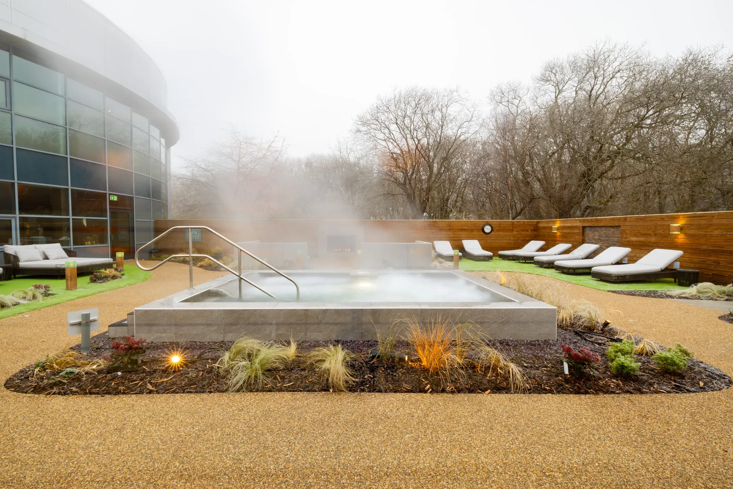 Comfy chairs and cocooning pods in our Spa Garden