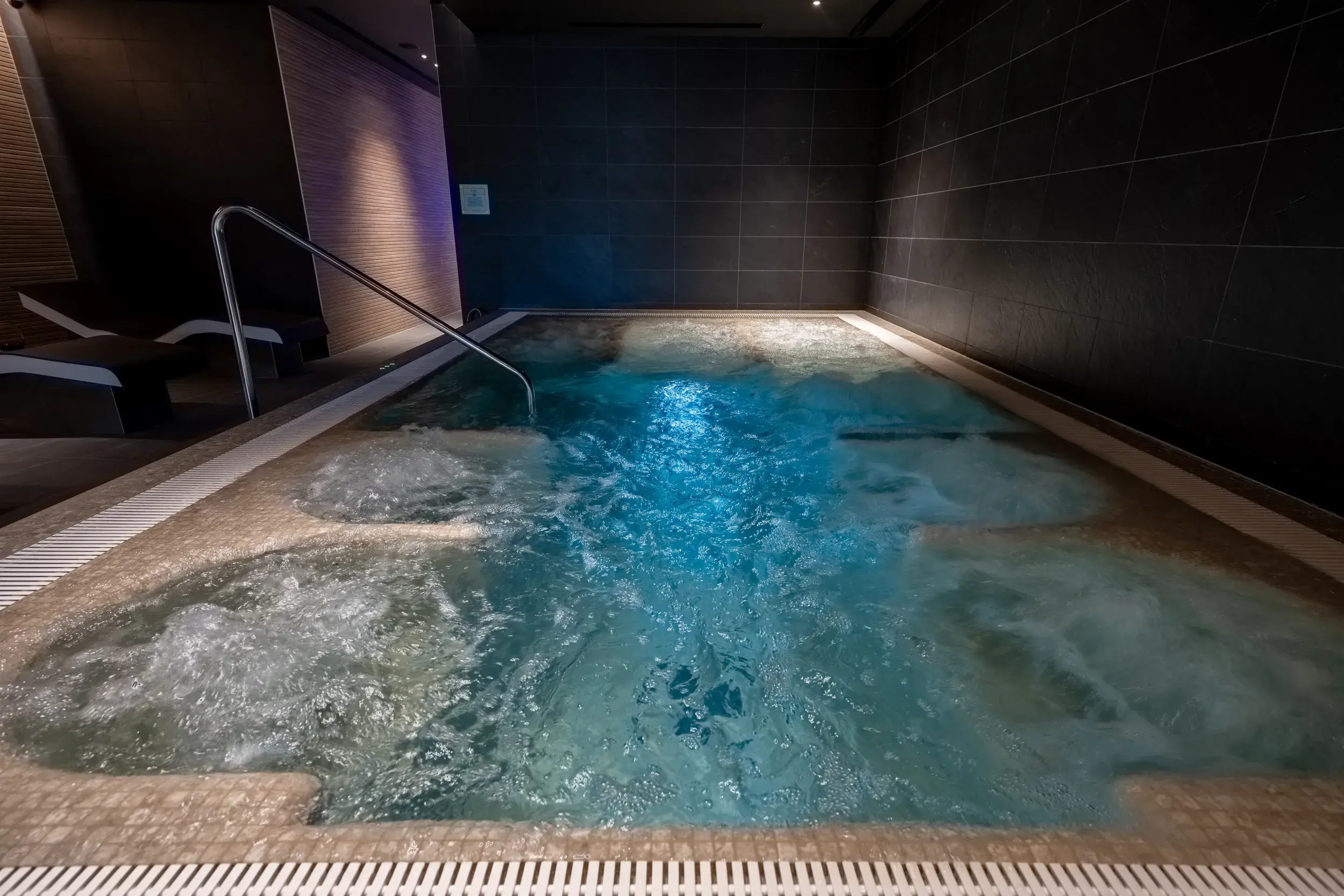 Two people relaxing in the sauna