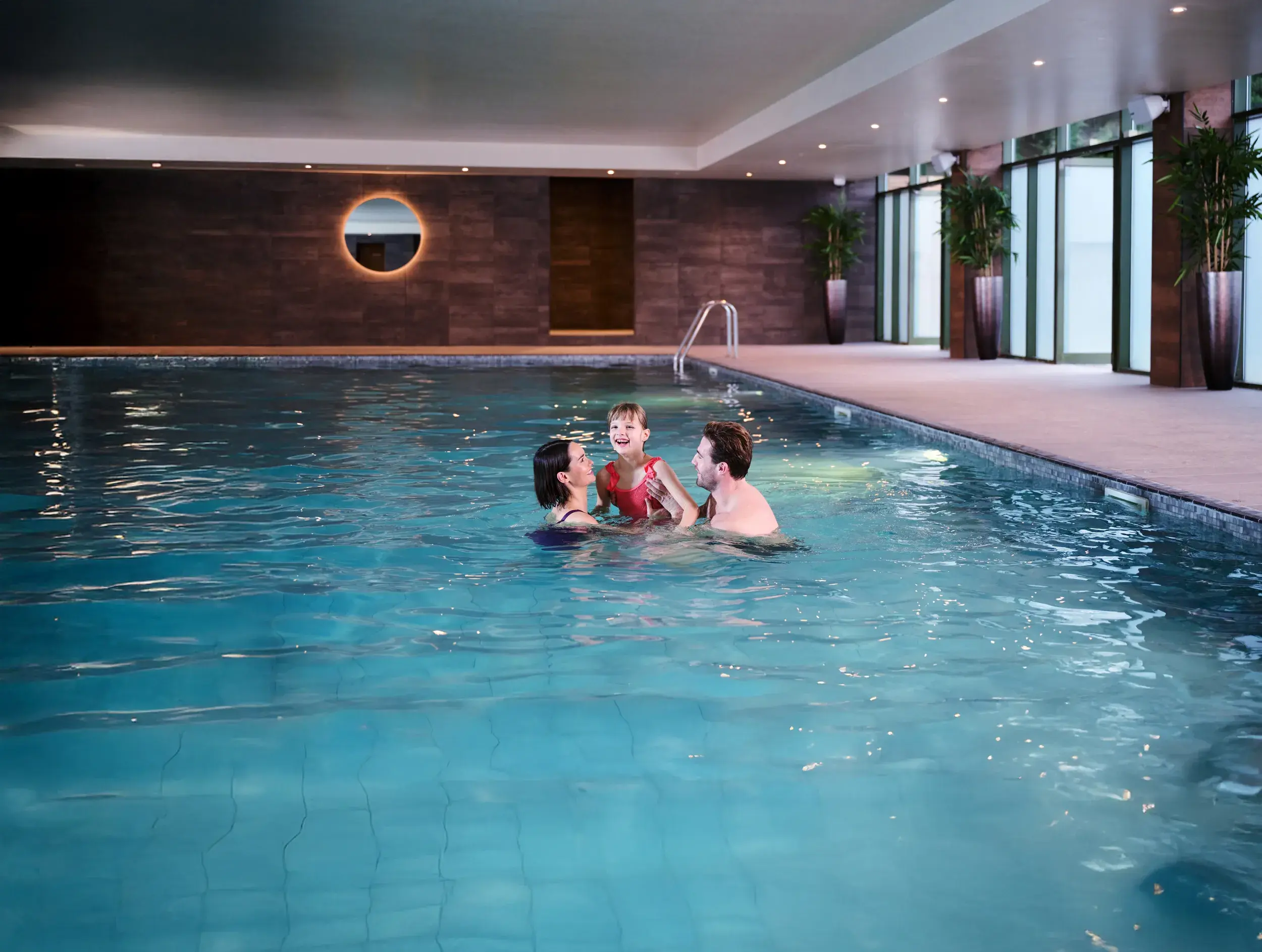 A family in the pool at Woking