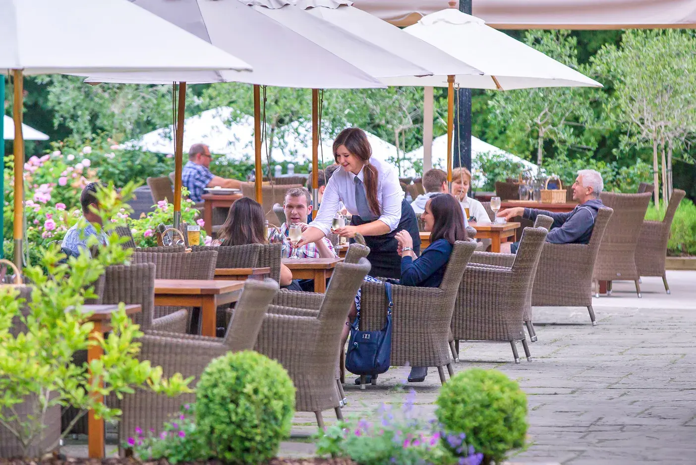 The terrace at David Lloyd Wickwoods, with people enjoying their meals