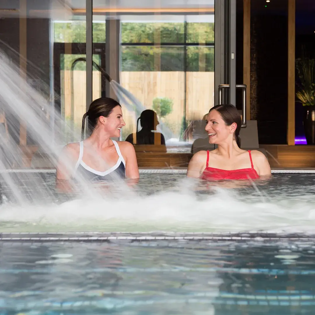 Two woman relaxing in the whirlpool