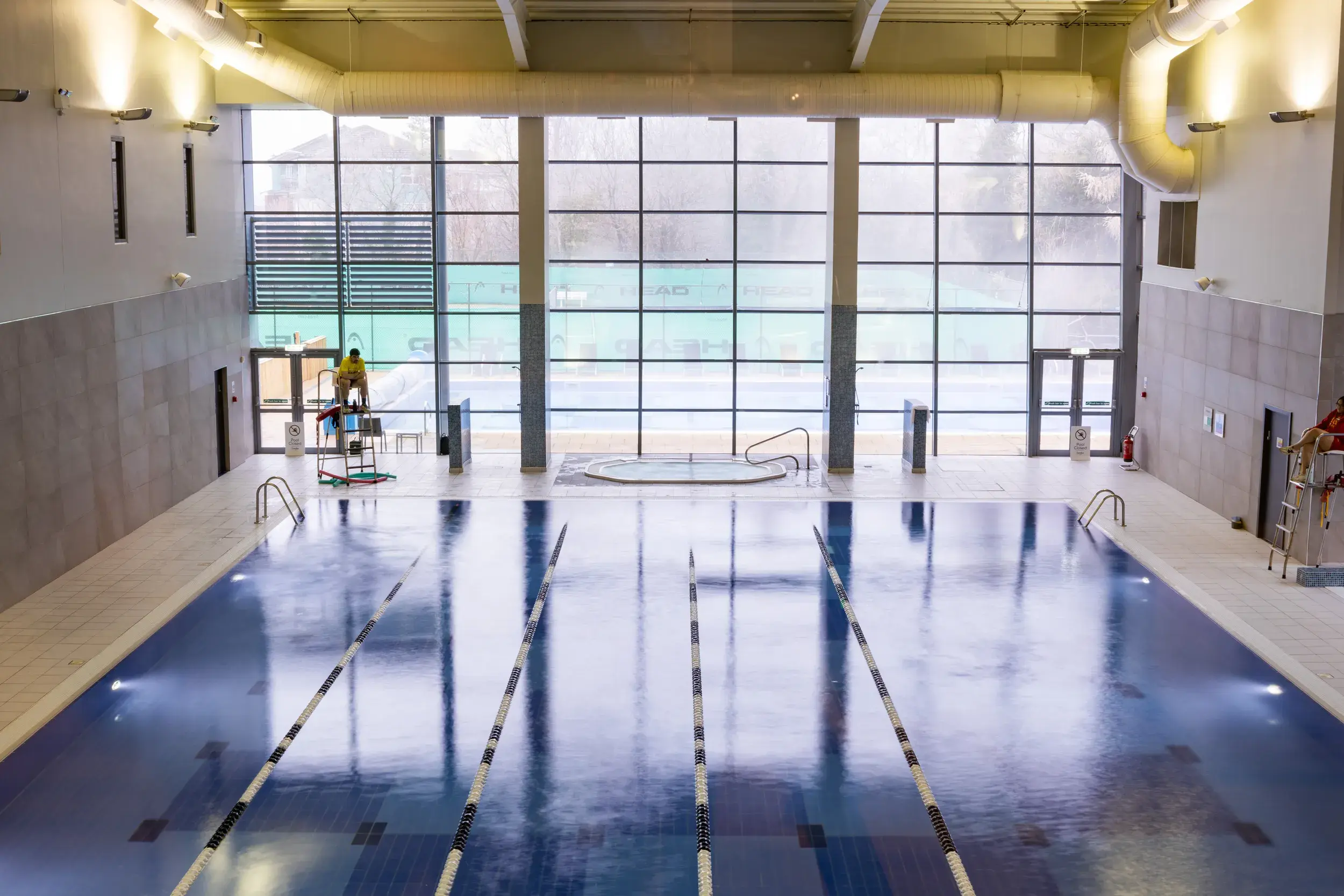 The indoor pool with large window at David Lloyd Glasgow West End