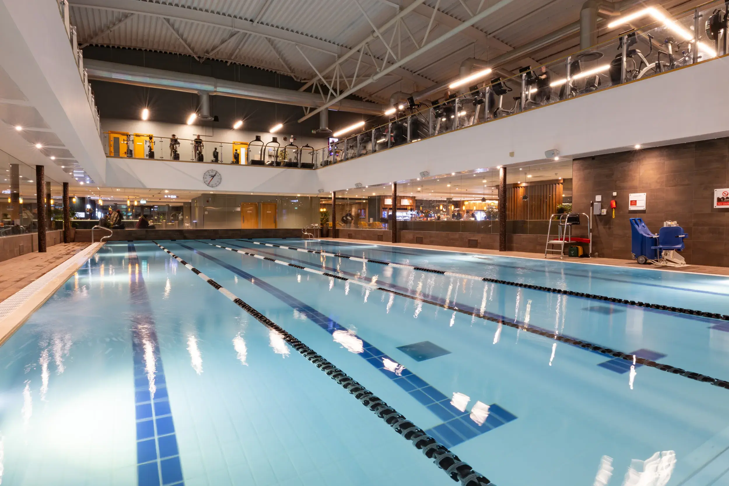 The indoor pool at Beckenham, with a balcony gym surrounding it.