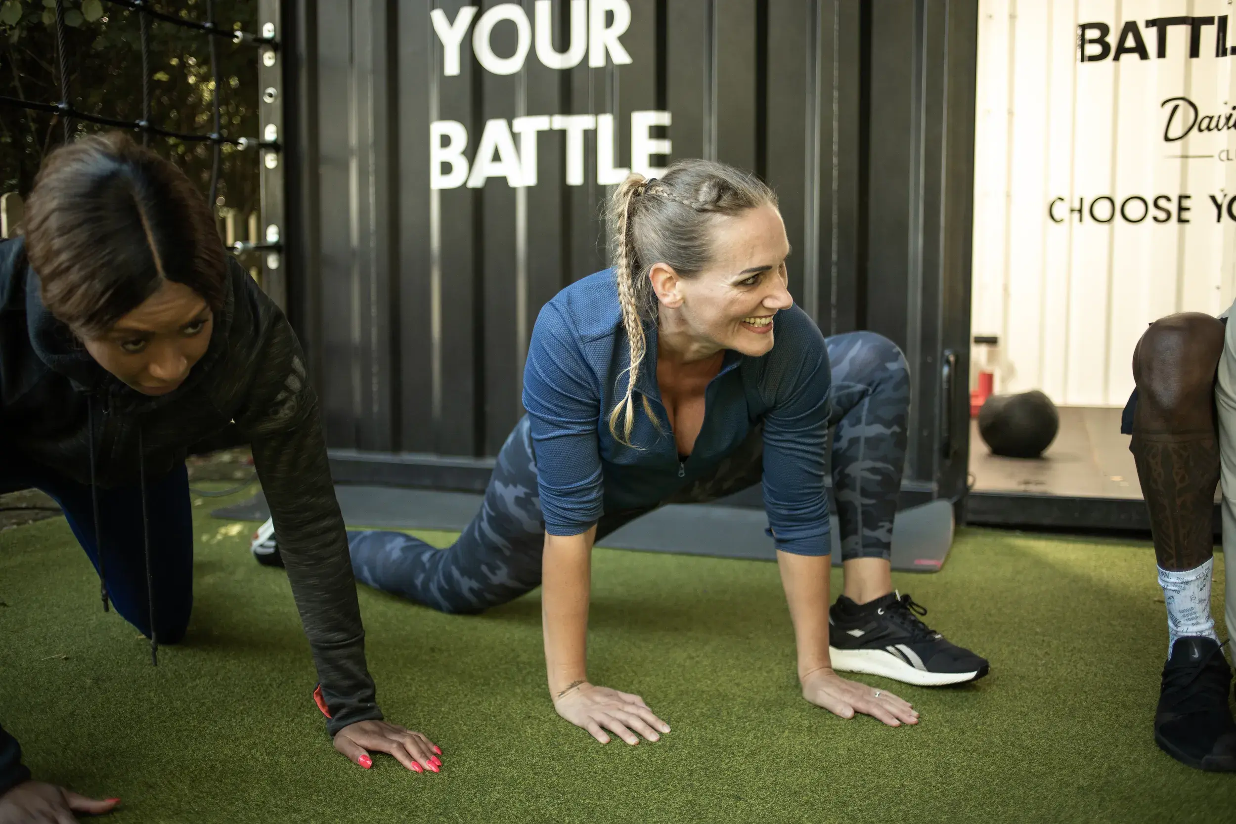 People stretching in a Battlebox class