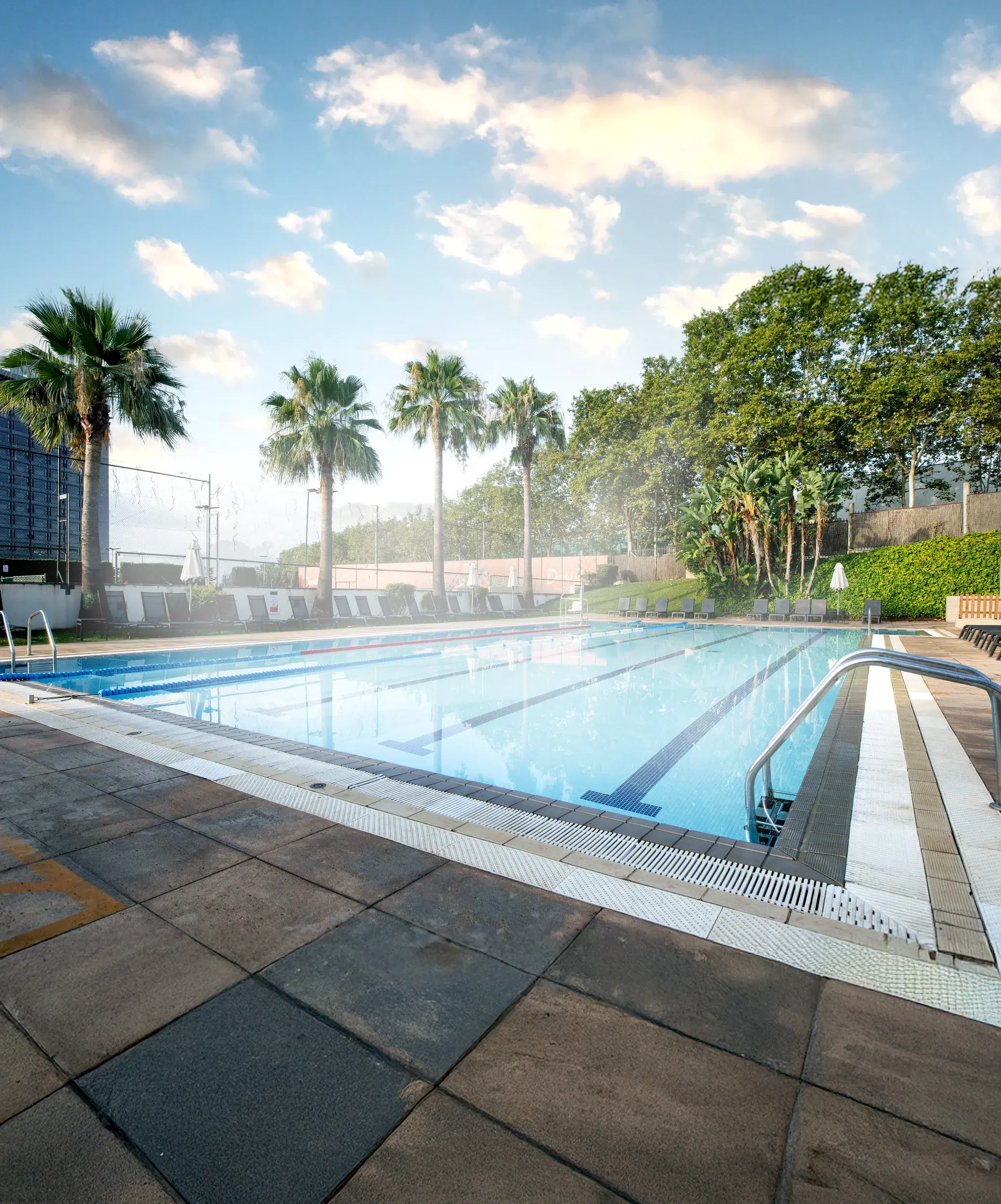 A family in the outdoor pool