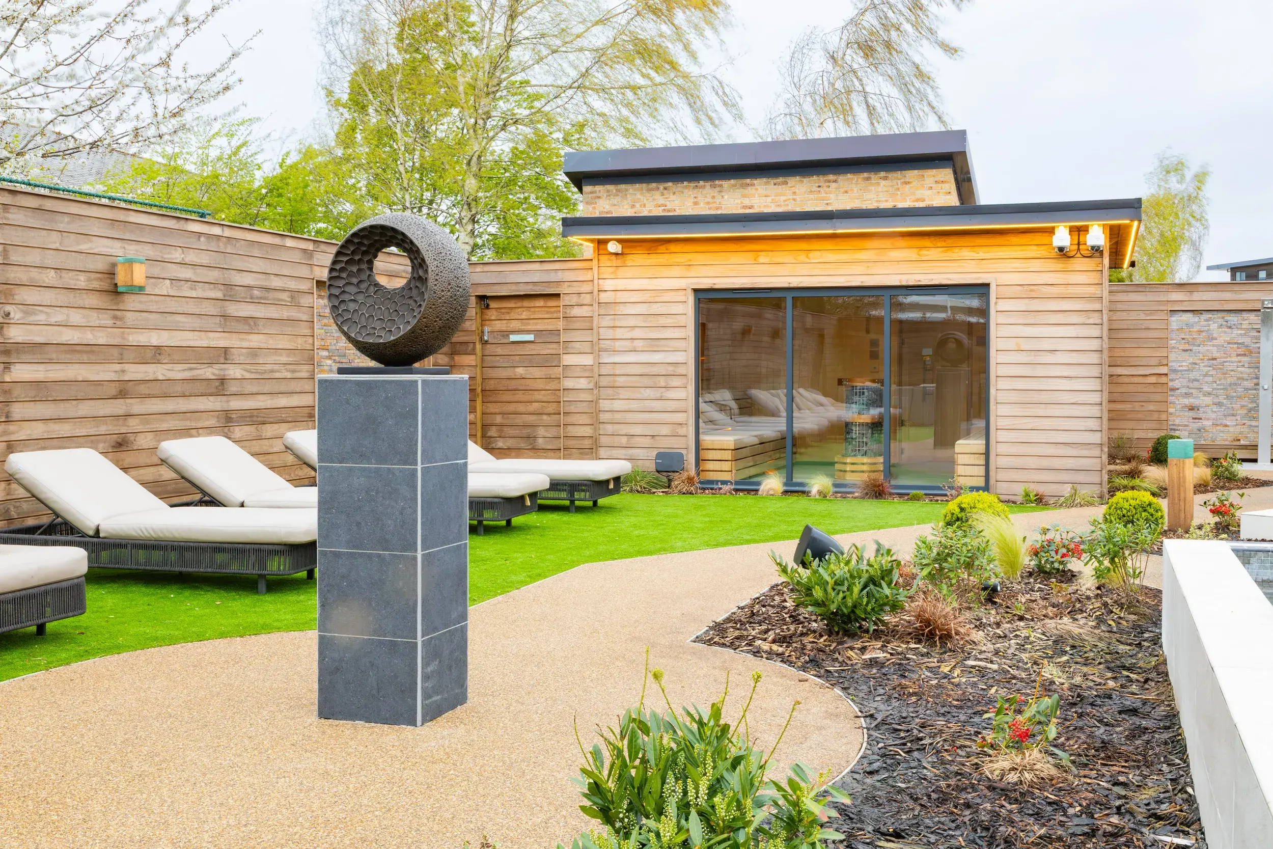 Loungers and sauna in our Spa Garden