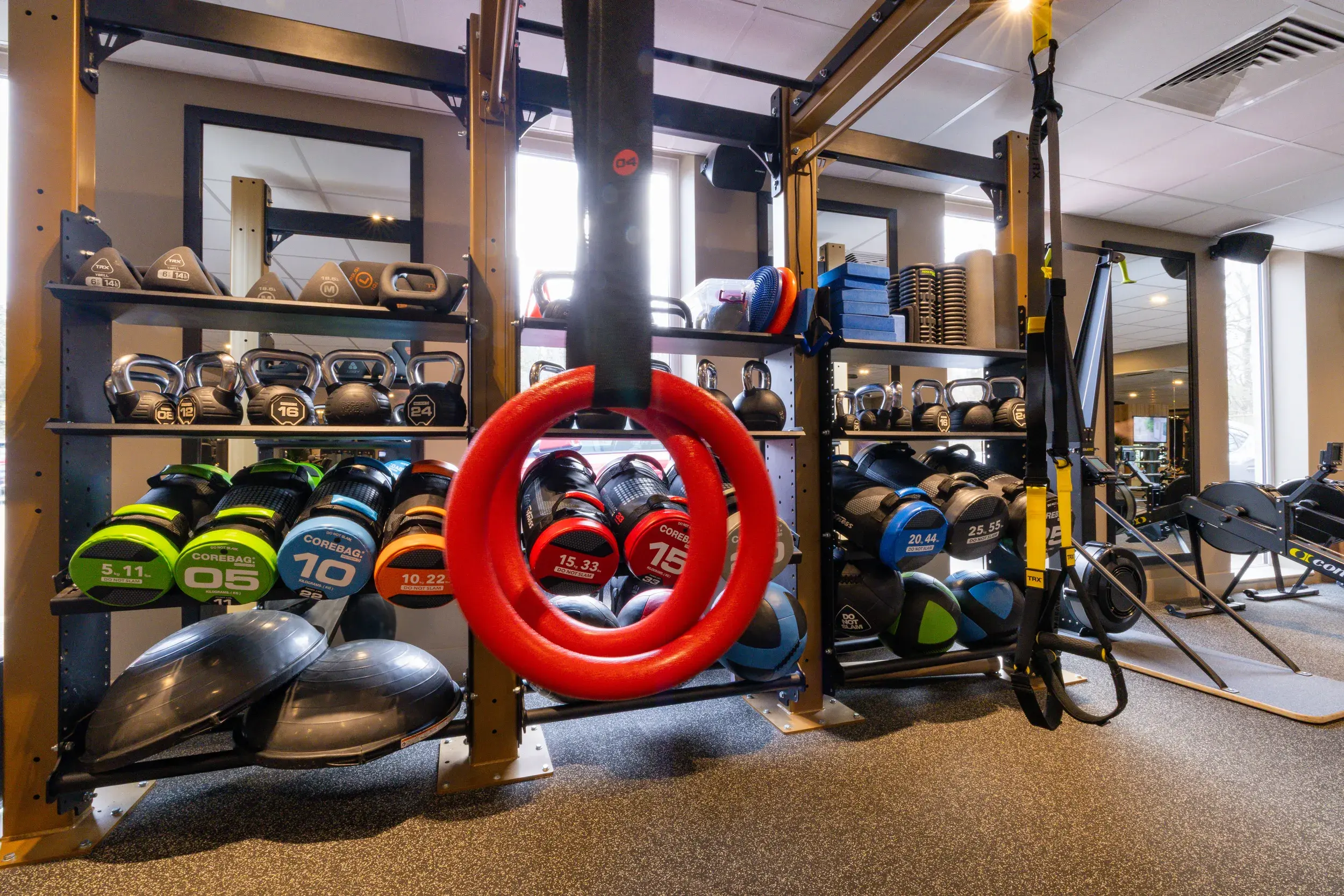 A rack of weights and Olympic lifting platforms