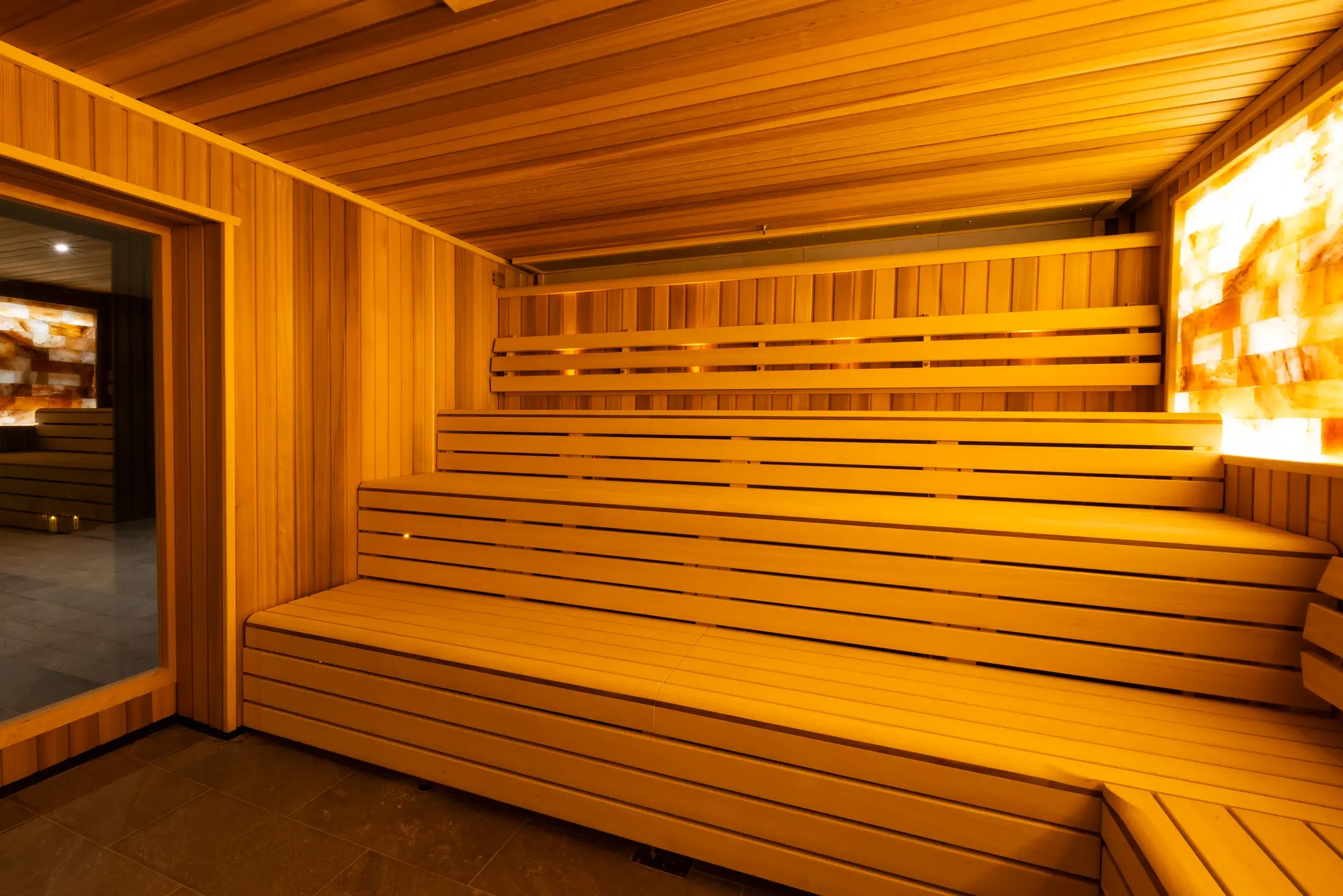 Two people enjoying the sauna