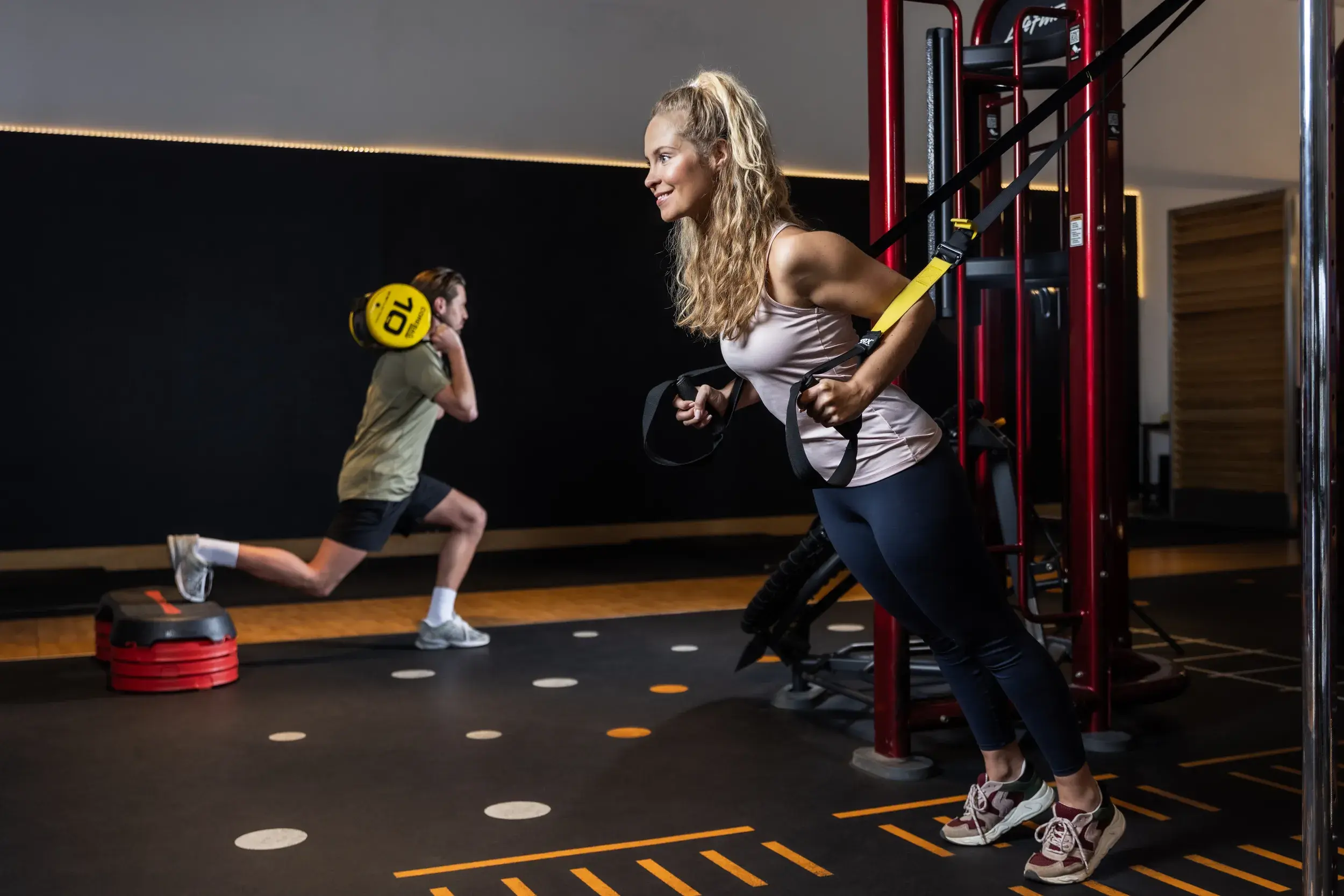 A woman in the functional training area
