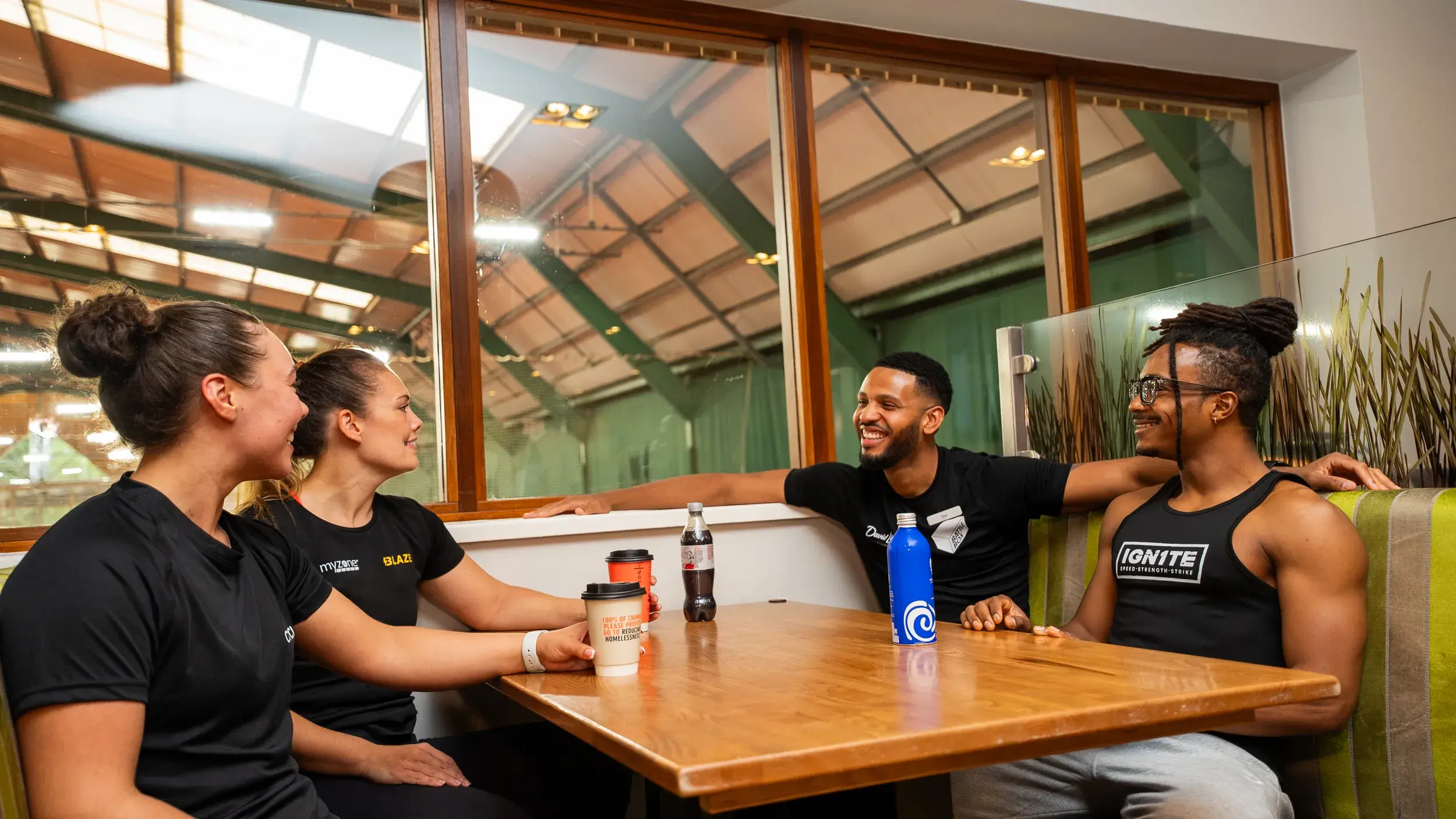 Team members enjoying a coffee
